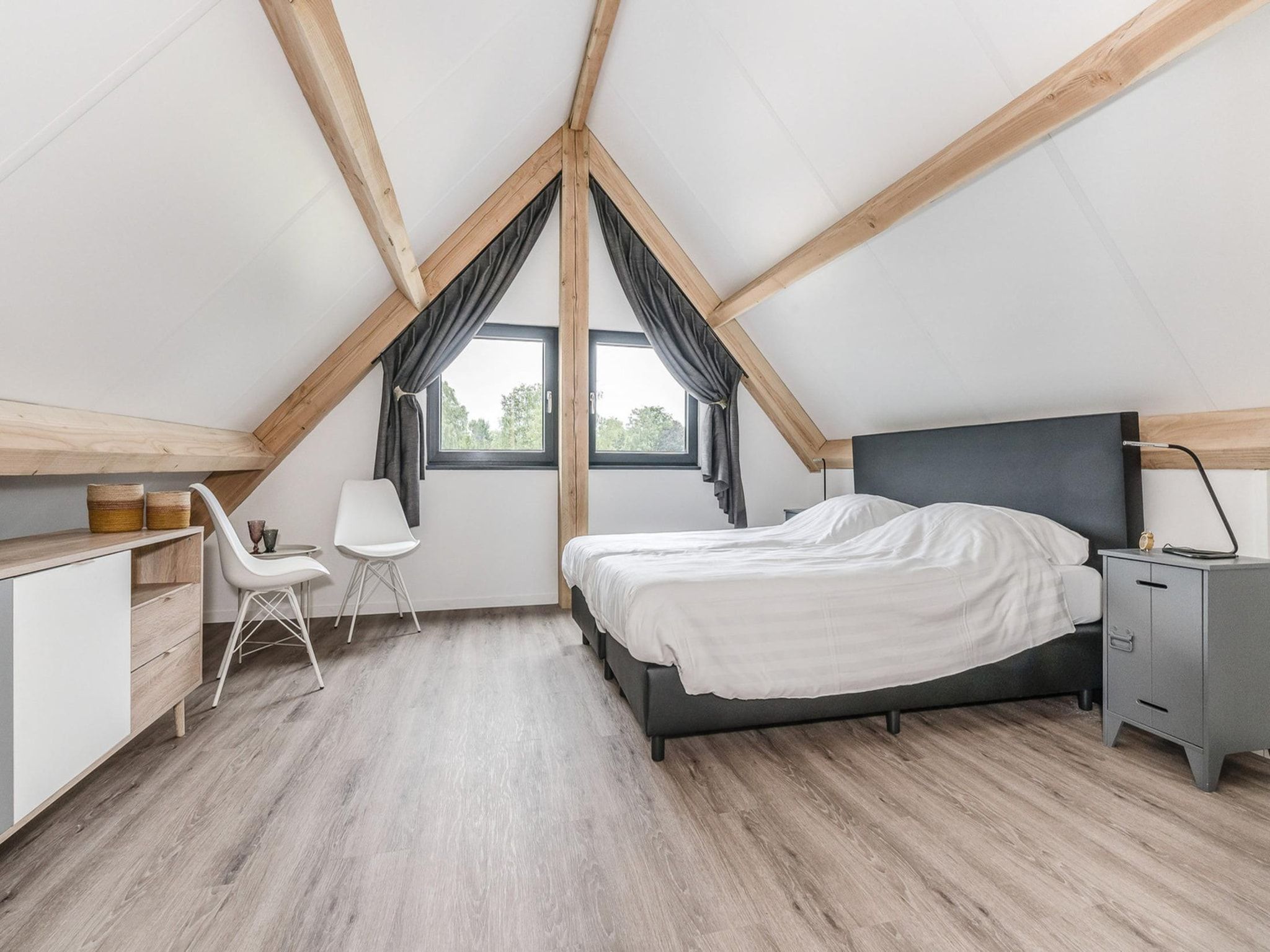 Een slaapkamer van Farm Lodge 676 in Baarle-nassau