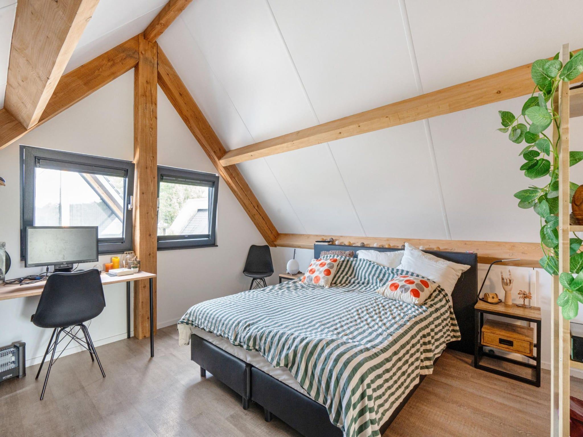 Een slaapkamer van Watersnip 12b - 706 in Baarle-nassau