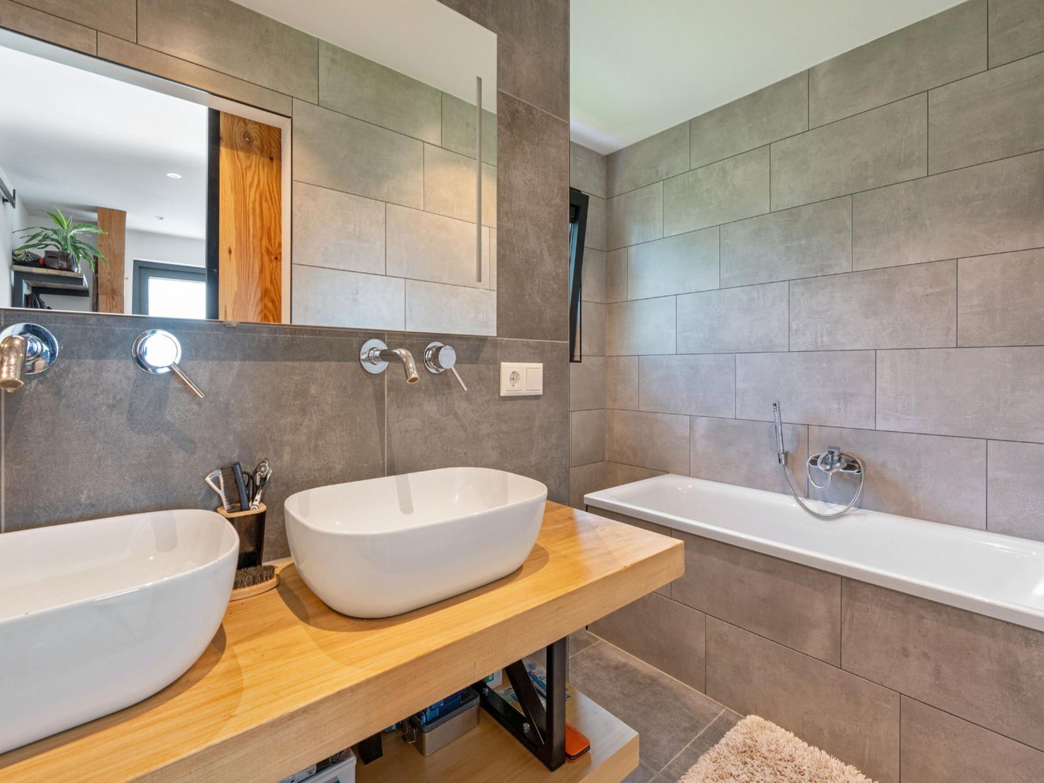 De badkamer van Watersnip 12b - 706 in Baarle-nassau