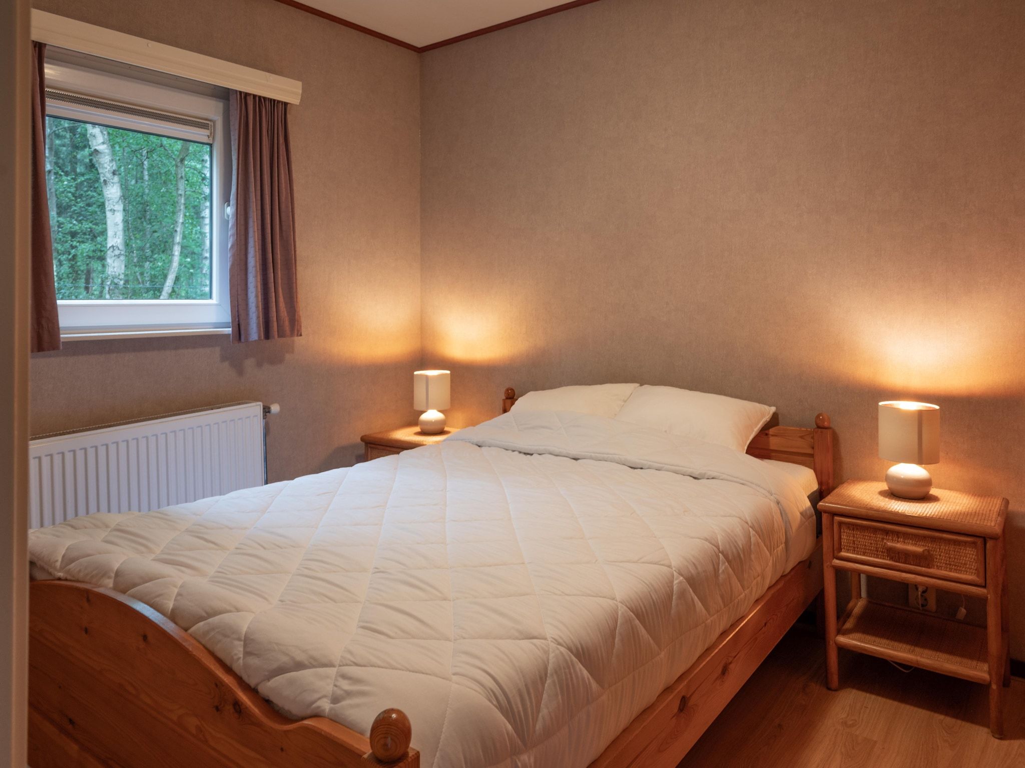 Een slaapkamer van Vakantie home Coevorderweg in Stegeren