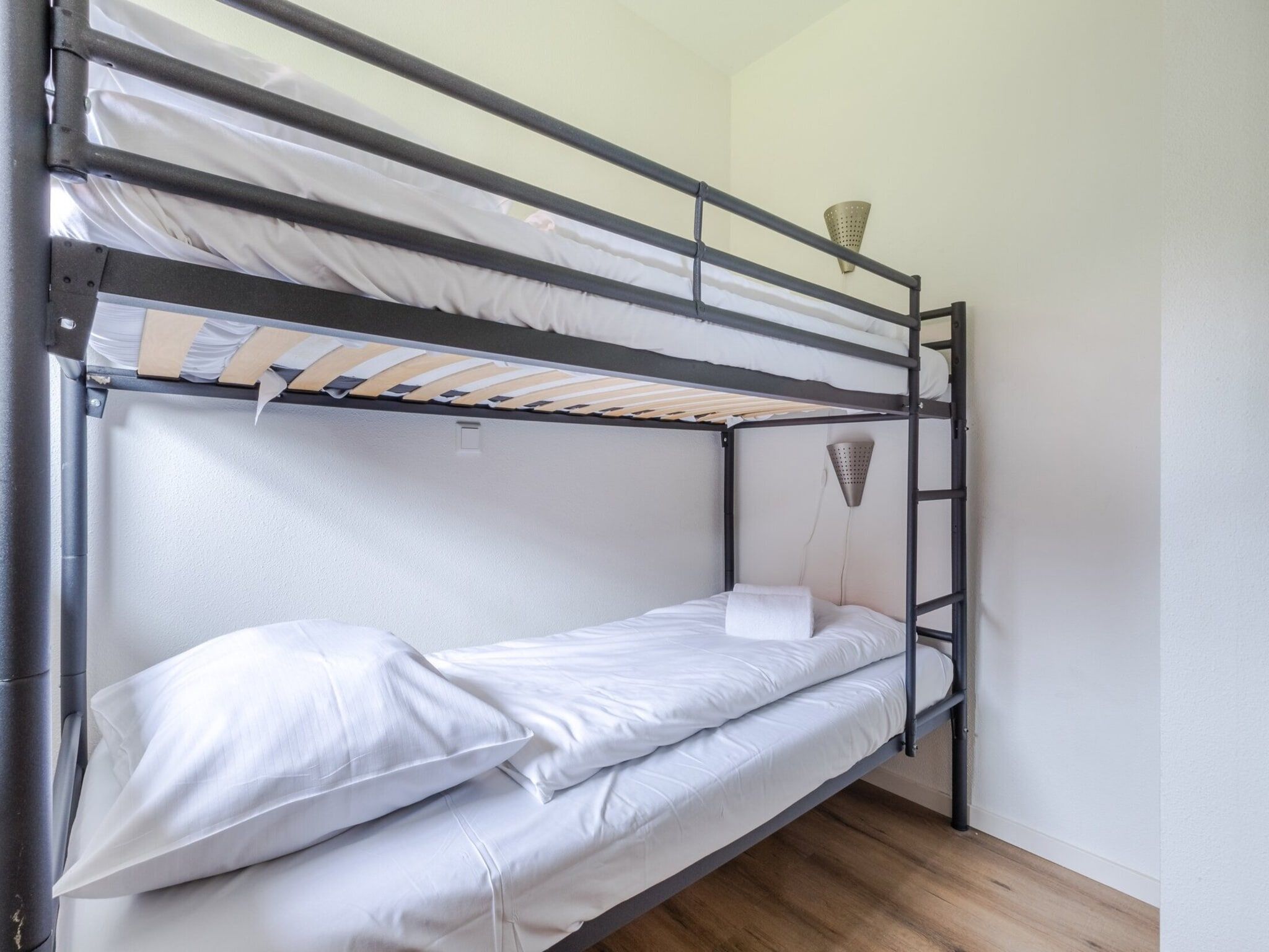 Een slaapkamer van Kustpark Texel 6 in De Koog