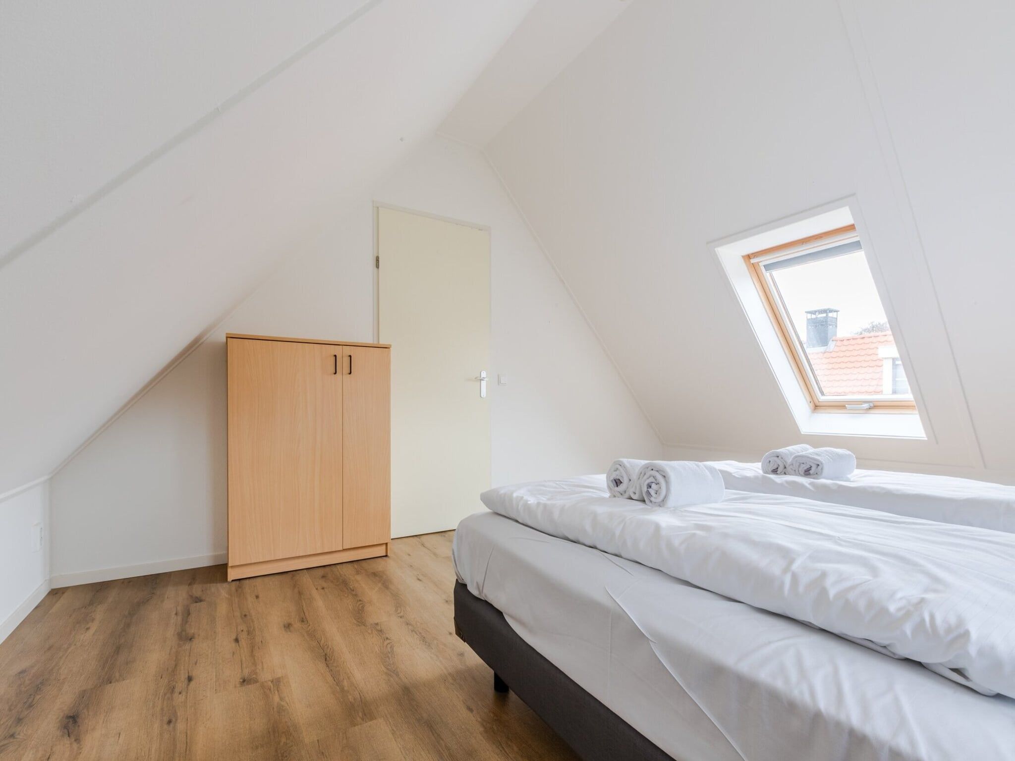 Een slaapkamer van Kustpark Texel 6 in De Koog