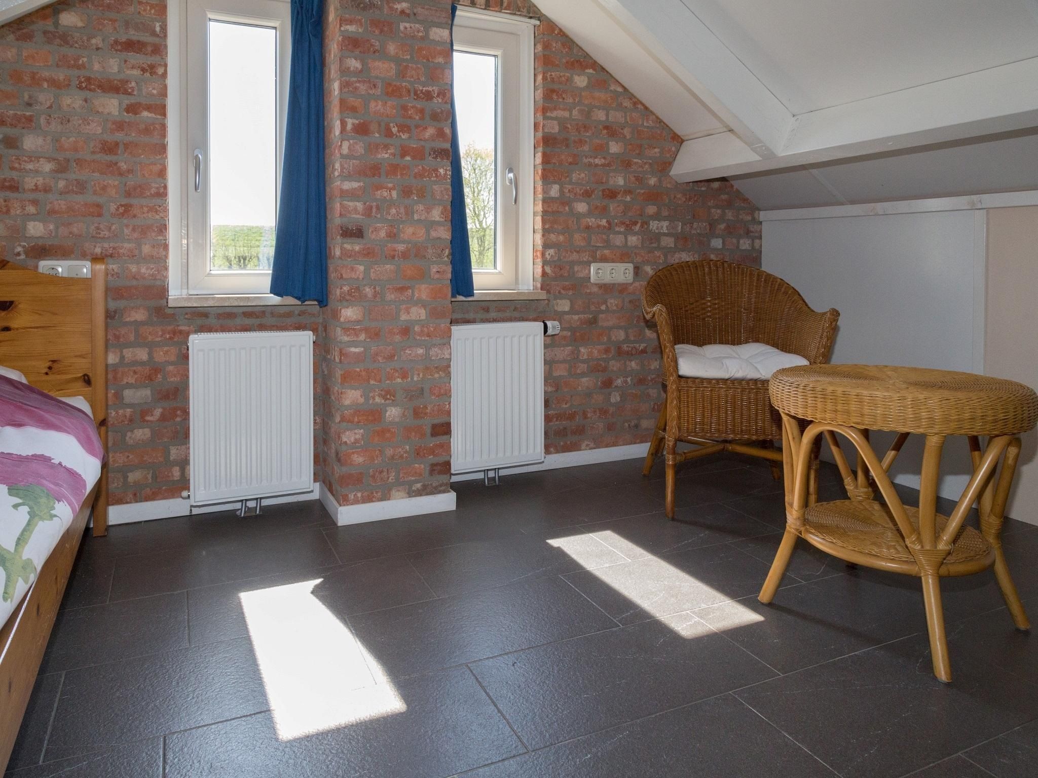Een slaapkamer van 2 fijne Zeeuwse huisjes in Baarland