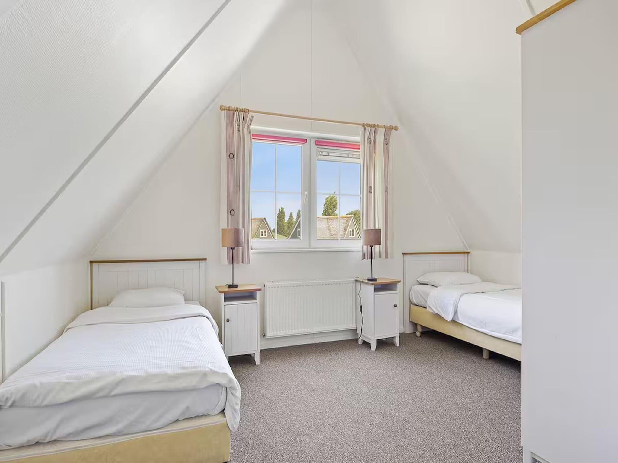 Een slaapkamer van Villa in Makkum - 2 PAX in Makkum