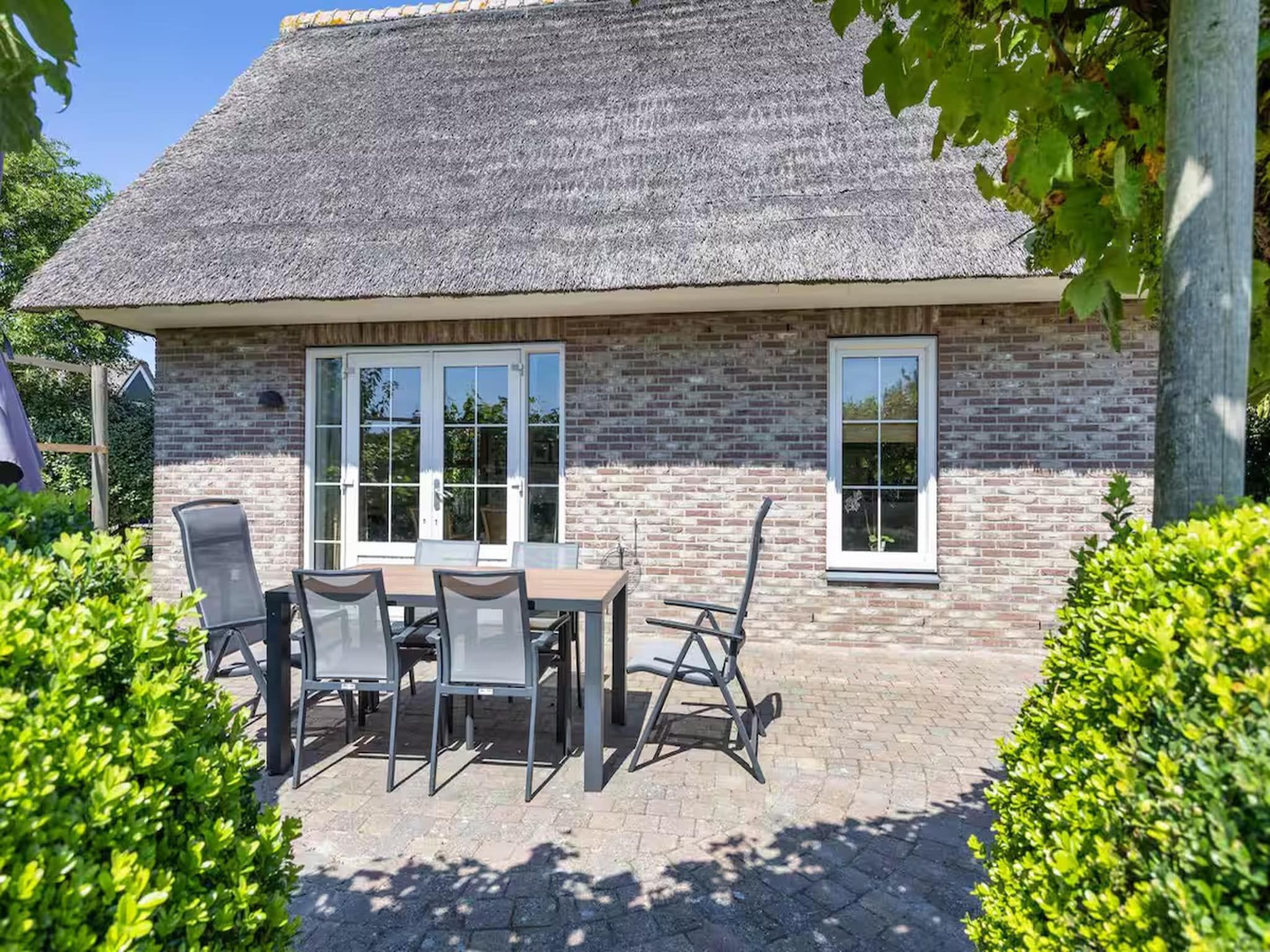 Het terras van Villa in Makkum - 2 PAX in Makkum