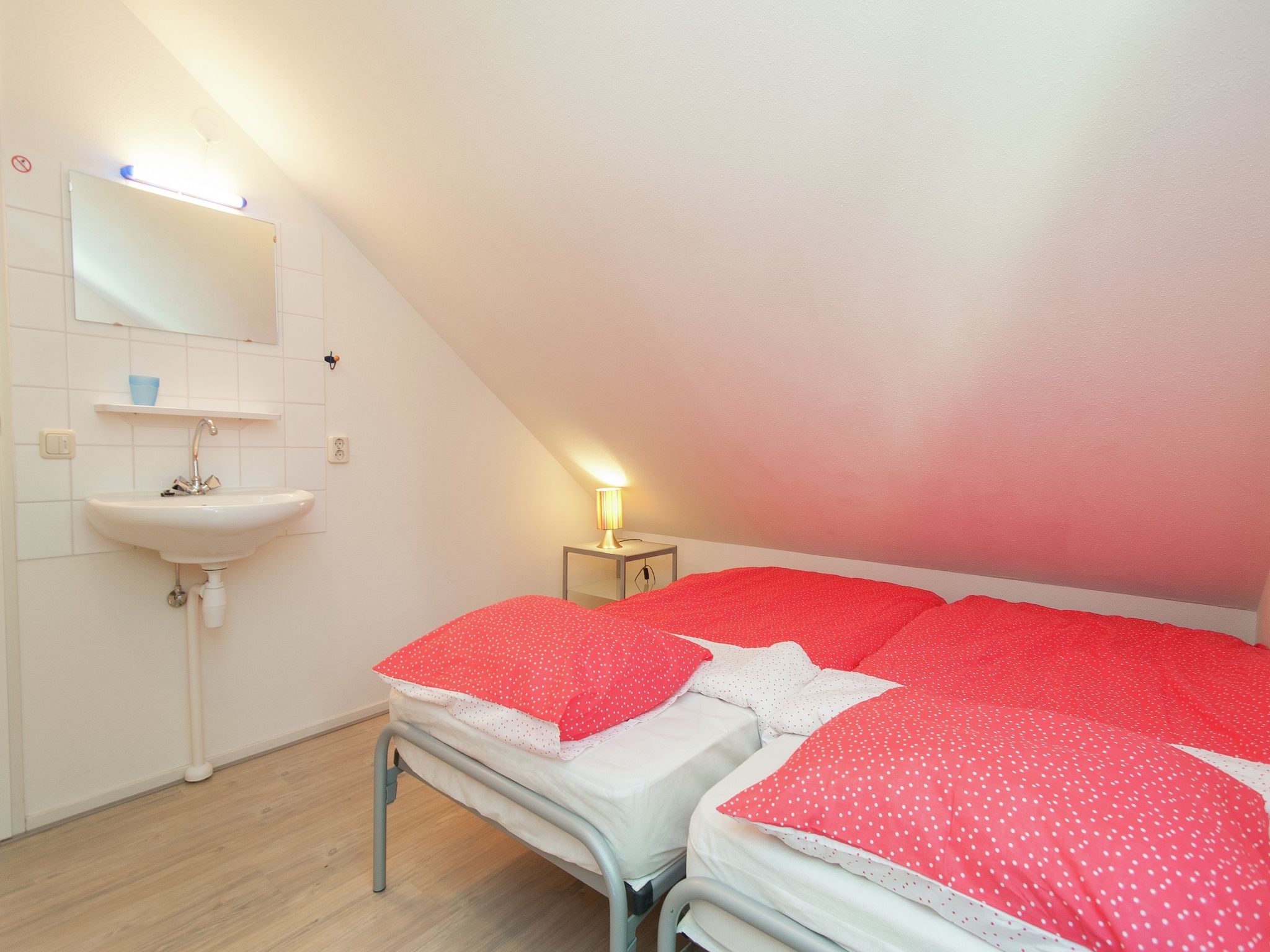 Een slaapkamer van De Meerkoet in Oudemirdum