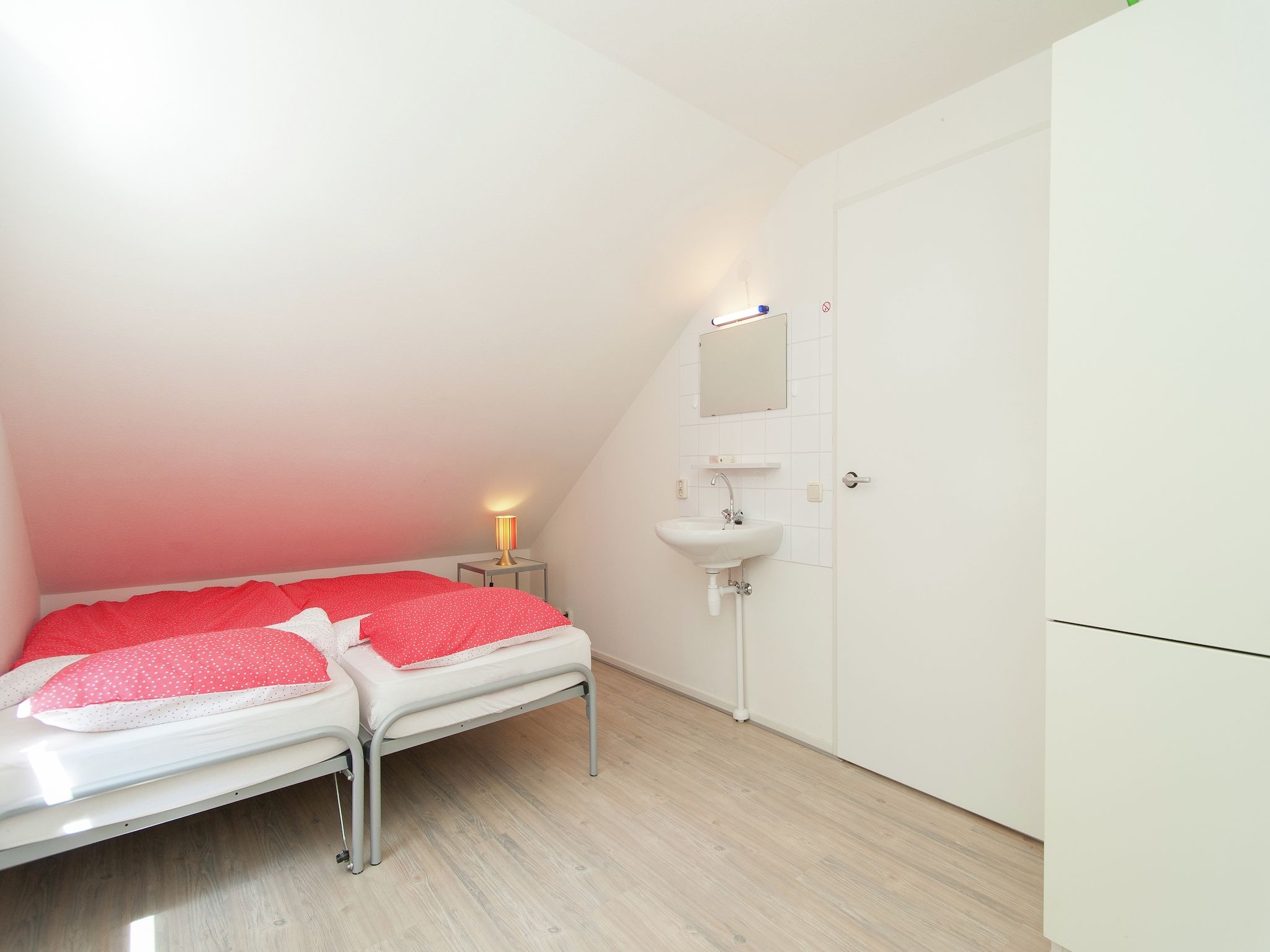 Een slaapkamer van De Meerkoet in Oudemirdum