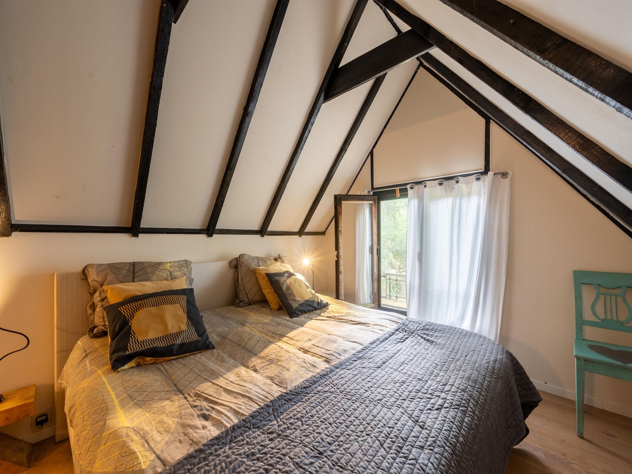 Een slaapkamer van De Hagmolenbeek Boekelo in Boekelo