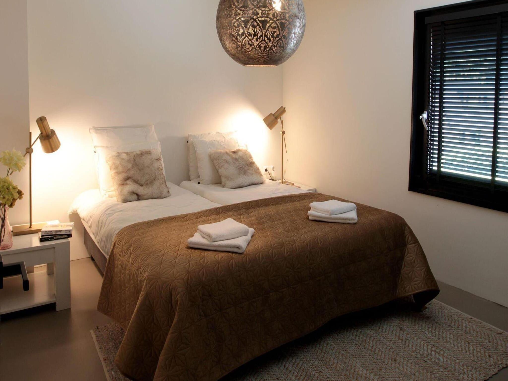 Een slaapkamer van 8-14 person group accommodation in Schoorl
