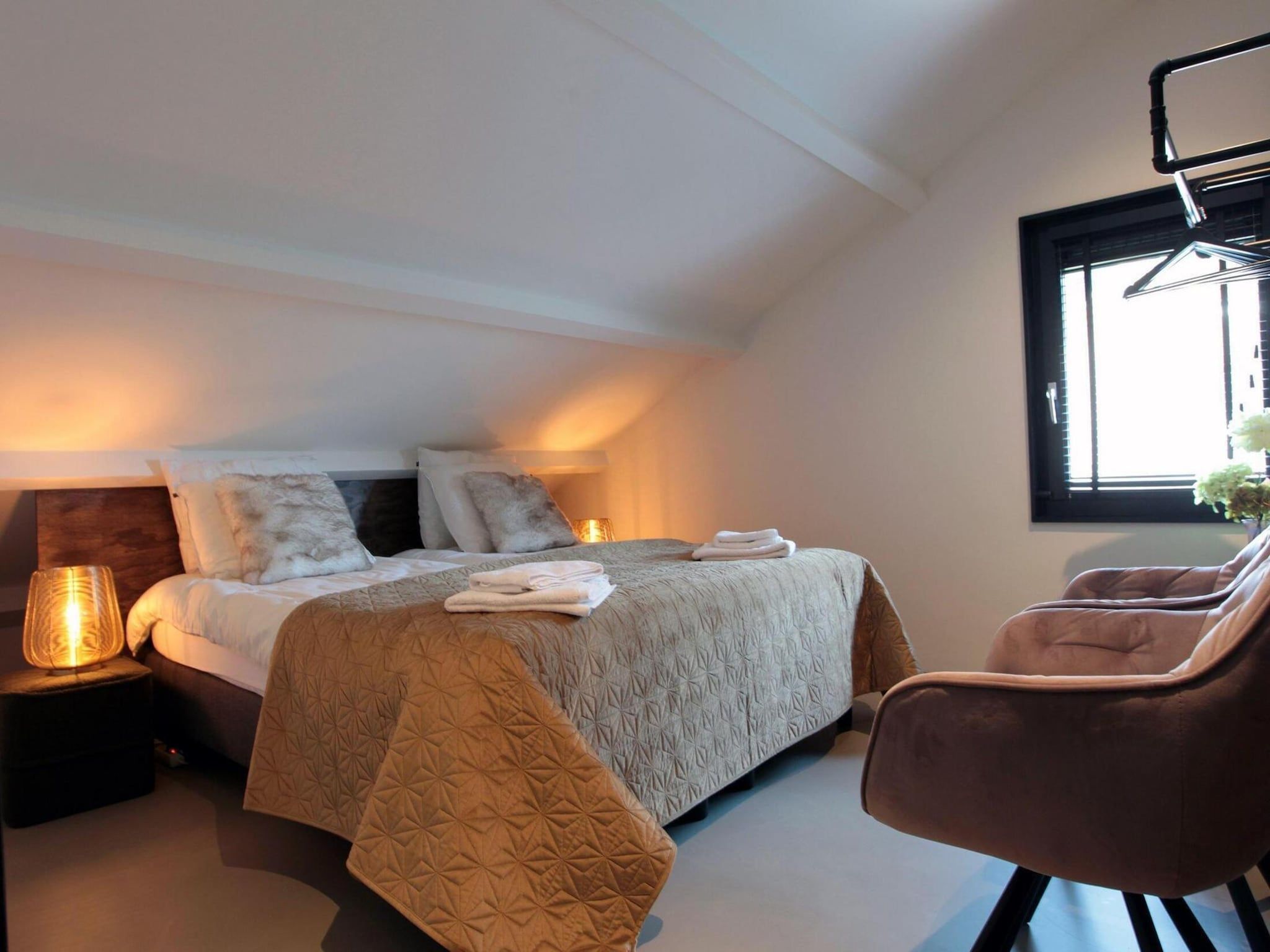 Een slaapkamer van 8-14 person group accommodation in Schoorl