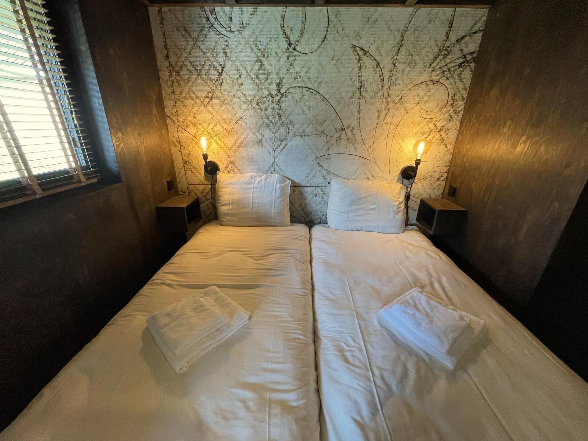 Een slaapkamer van 8-14 person group accommodation in Schoorl
