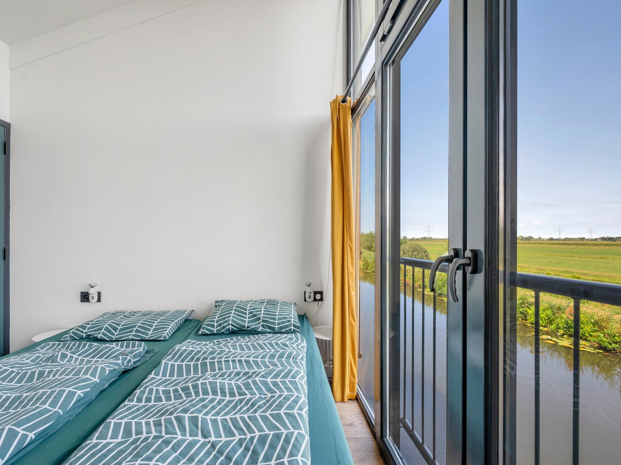 Een slaapkamer van De Waterlelie in Hekendorp