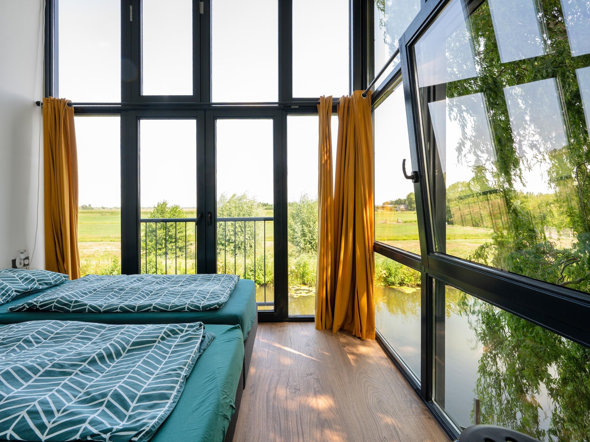 Een slaapkamer van De Waterlelie in Hekendorp