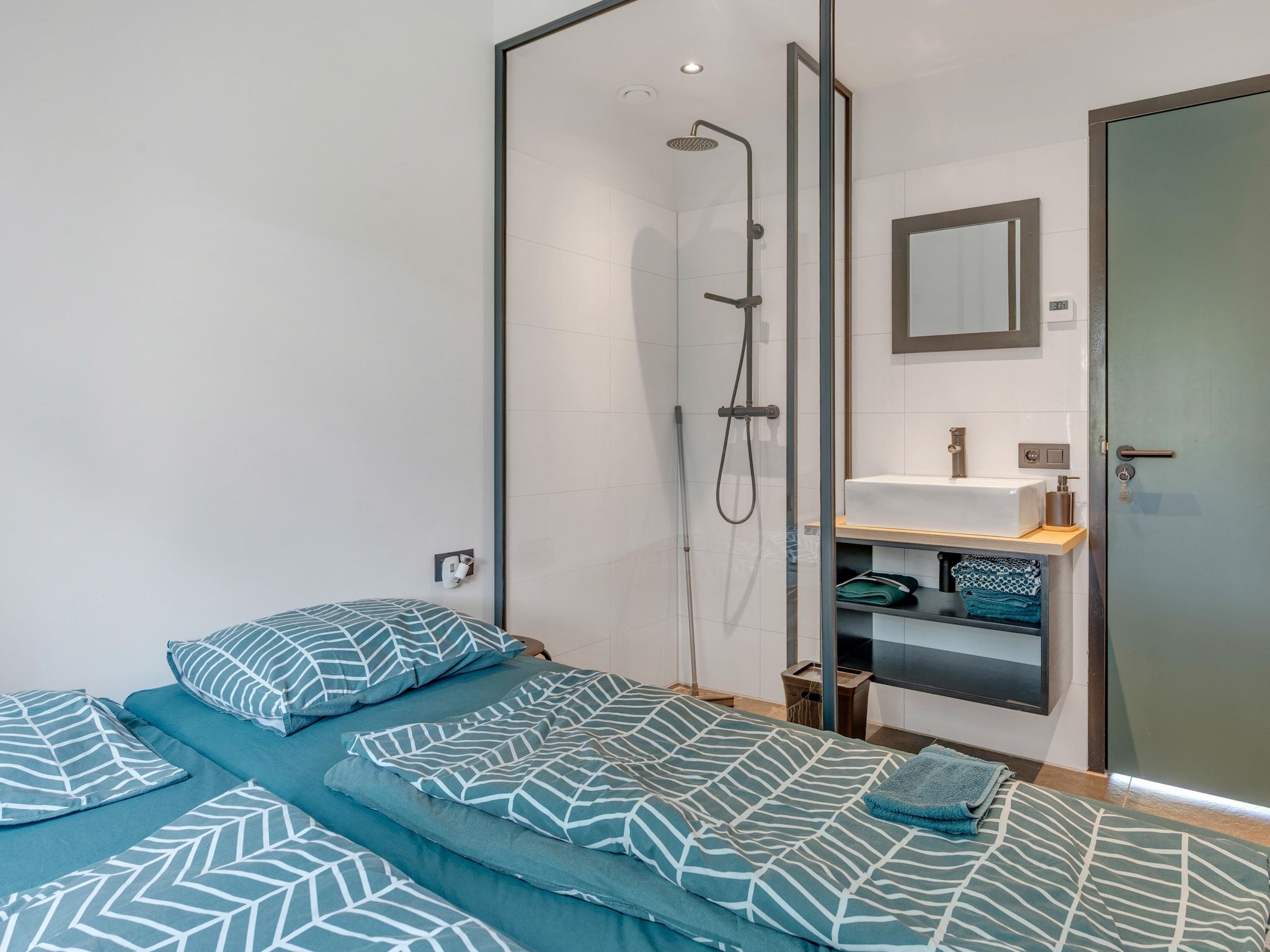 Een slaapkamer van De Waterlelie in Hekendorp