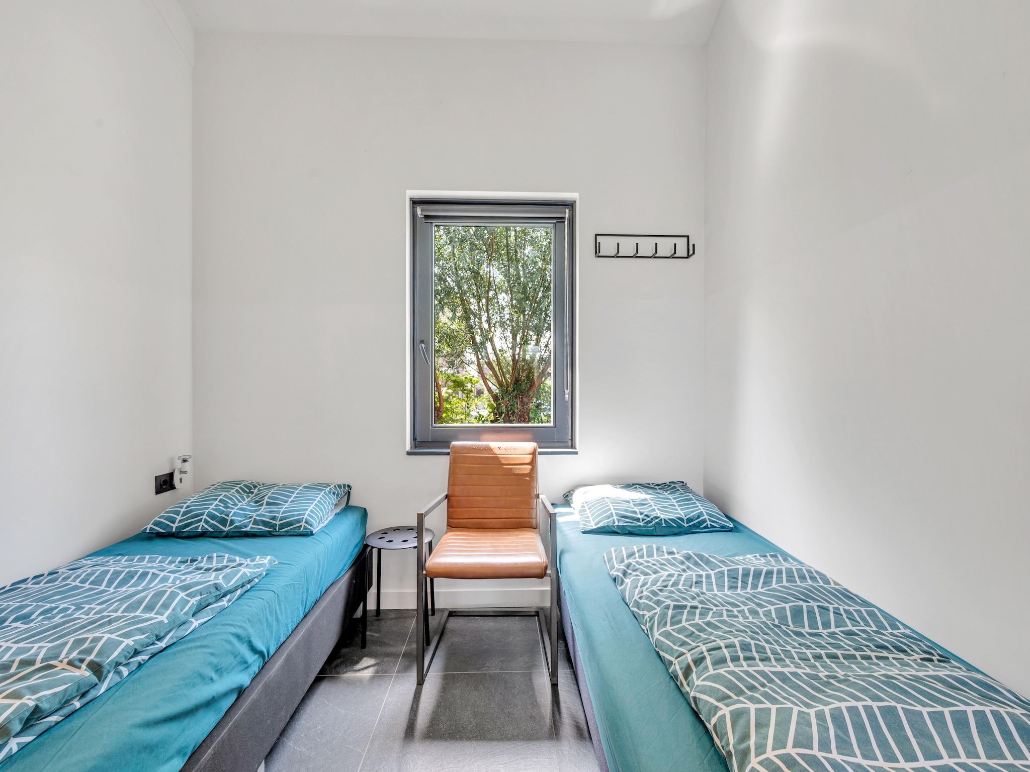 Een slaapkamer van De Waterlelie in Hekendorp