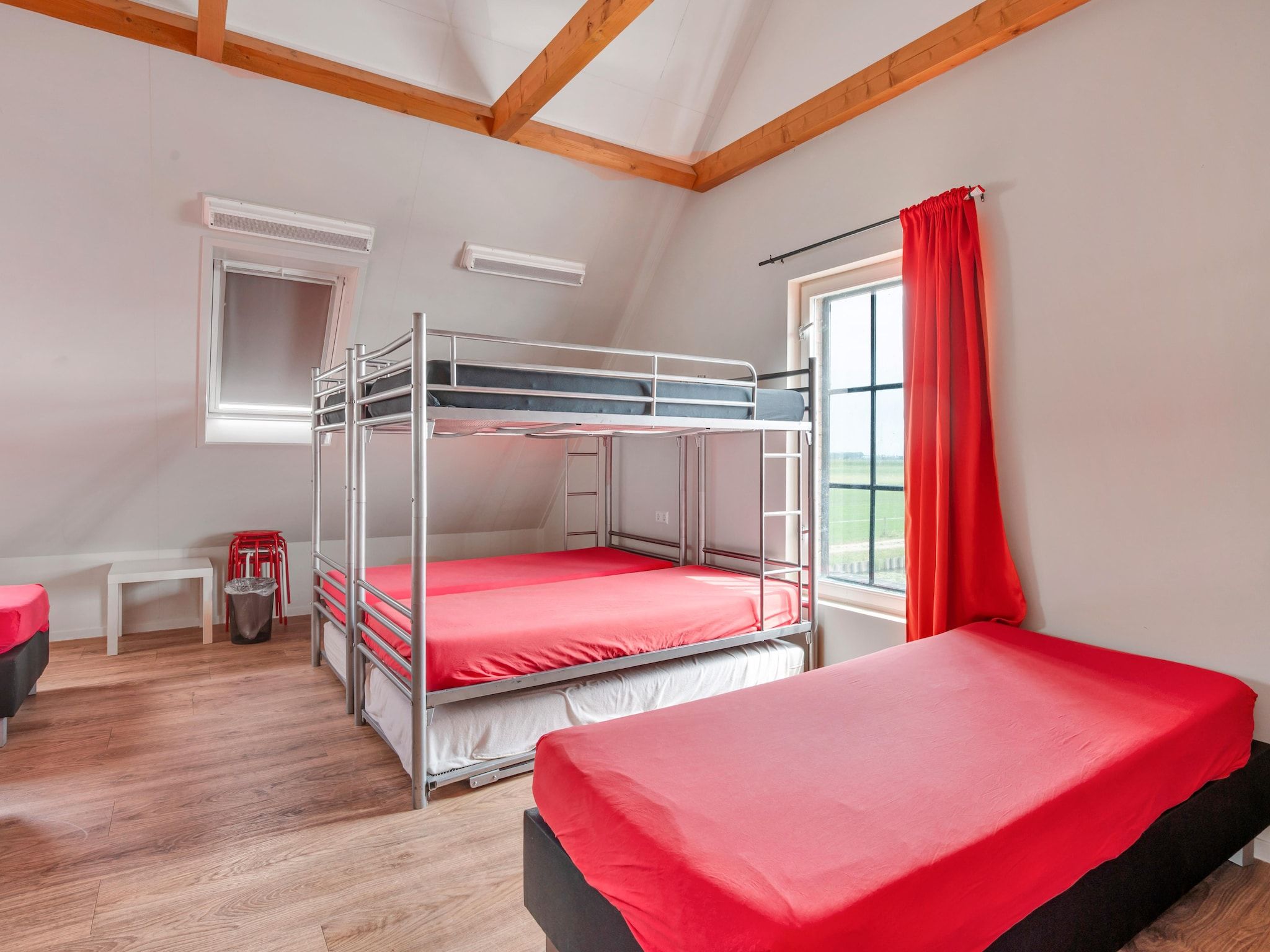 Een slaapkamer van De Kleine Stal in Snelrewaard