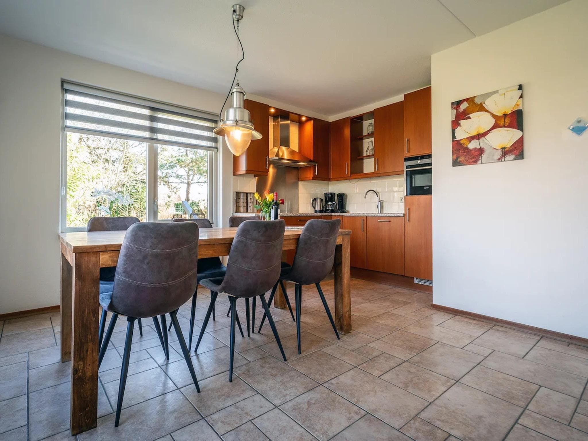 De eetkamer van 6-person villa in a Texel villa park in De Koog