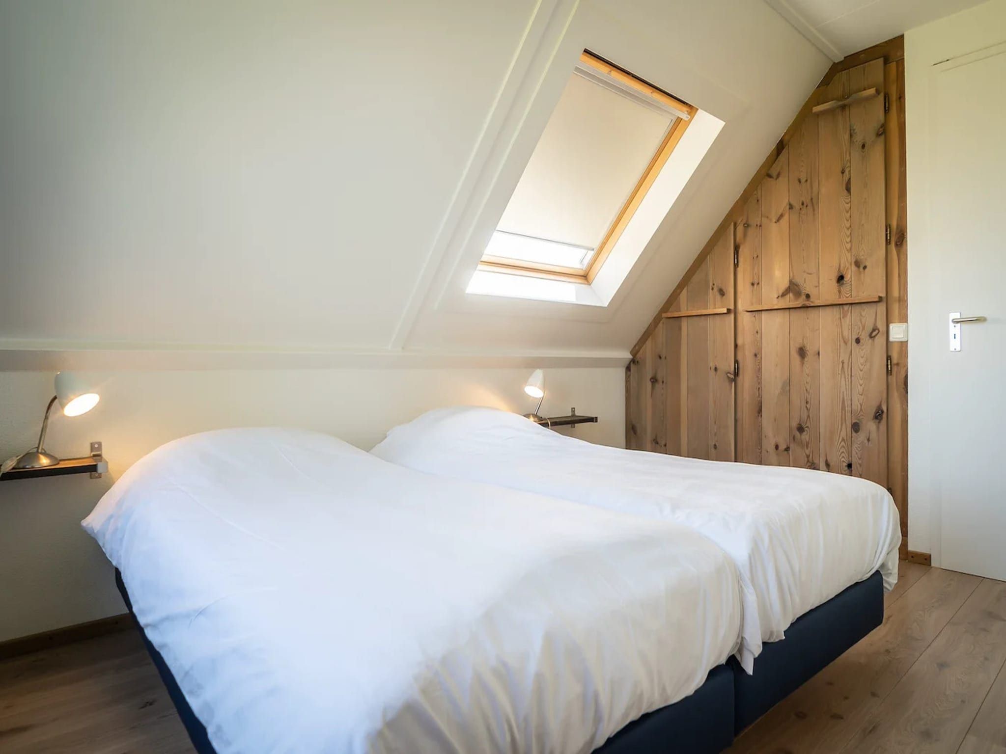 Een slaapkamer van 5-person luxury holiday villa on Texel in De Koog