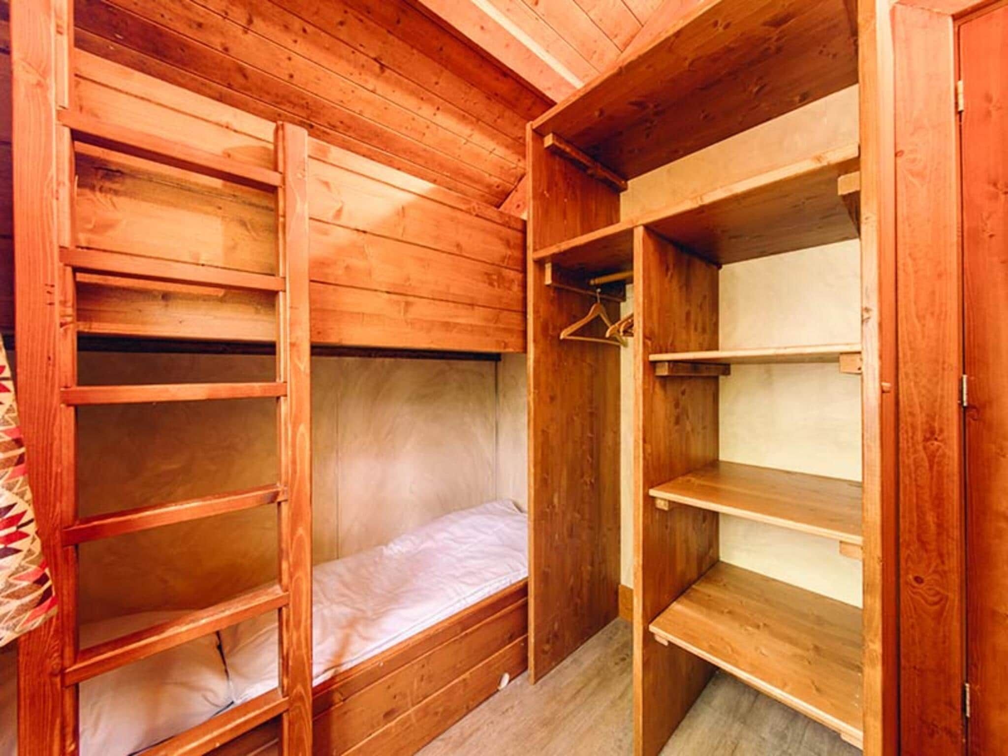 Een slaapkamer van Cowboy Cottage in Slagharen