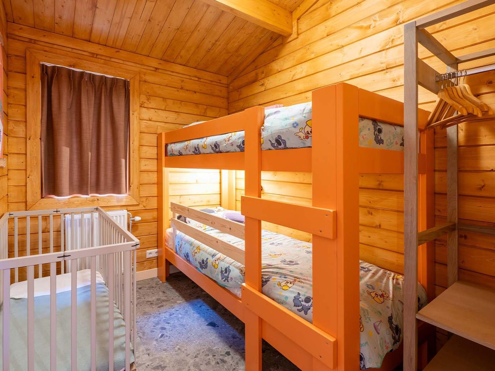 Een slaapkamer van Woezel & Pip Lodge 4p in Hoogerheide