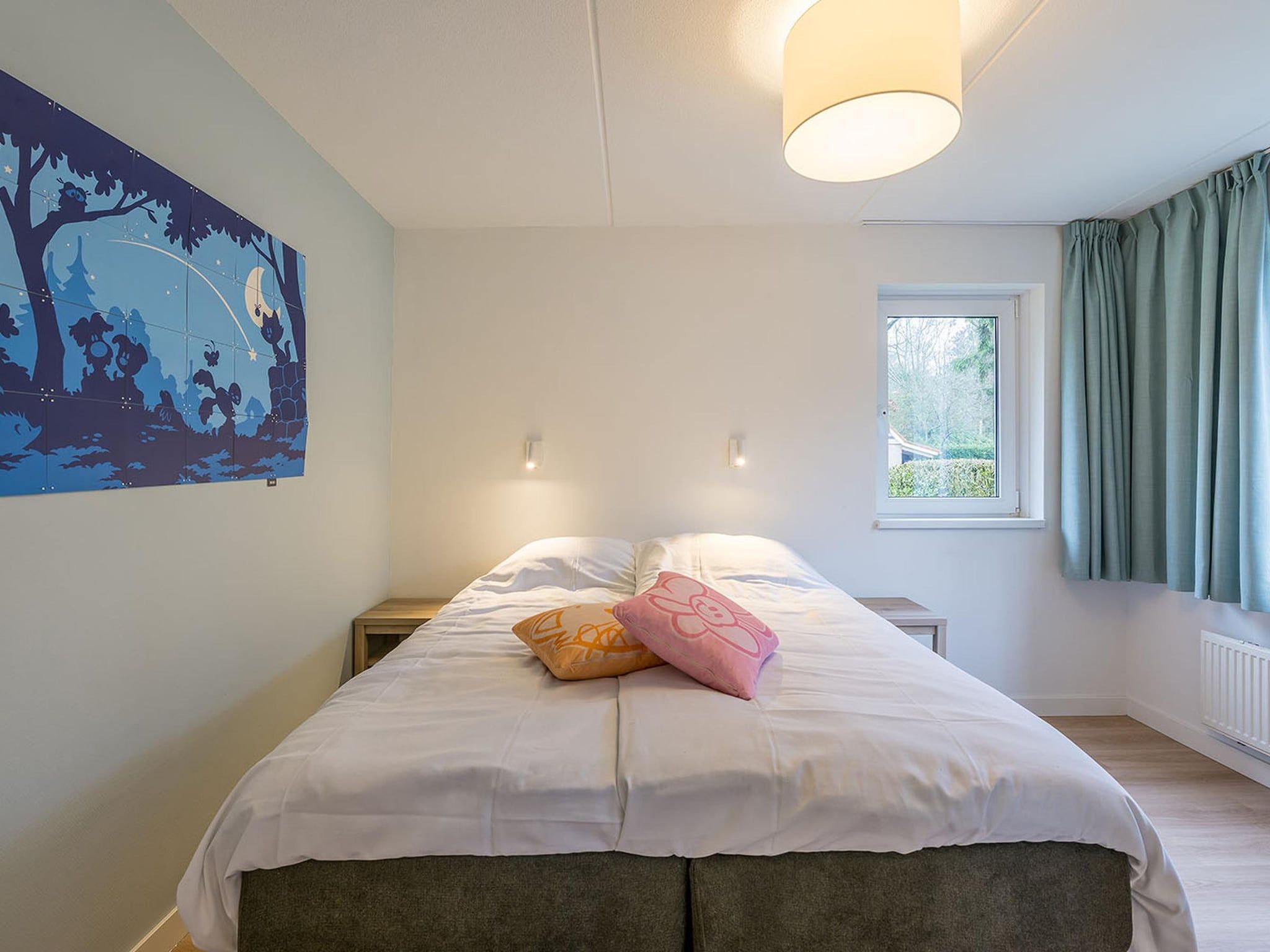 Een slaapkamer van Buurpoes Villa 7p in Hoogerheide