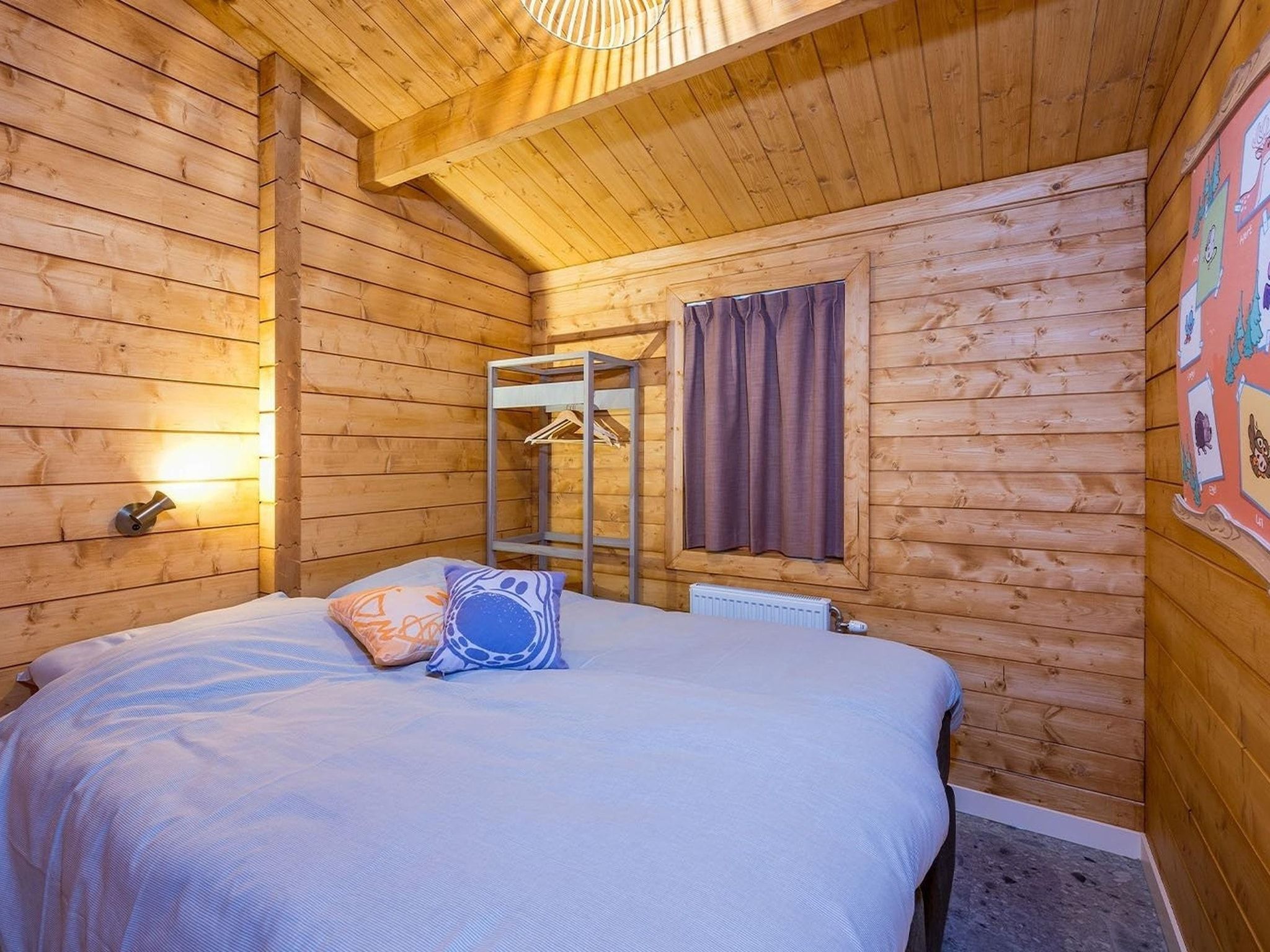 Een slaapkamer van Woezel & Pip Lodge 6p - Met Speelkamer in Hoogerheide
