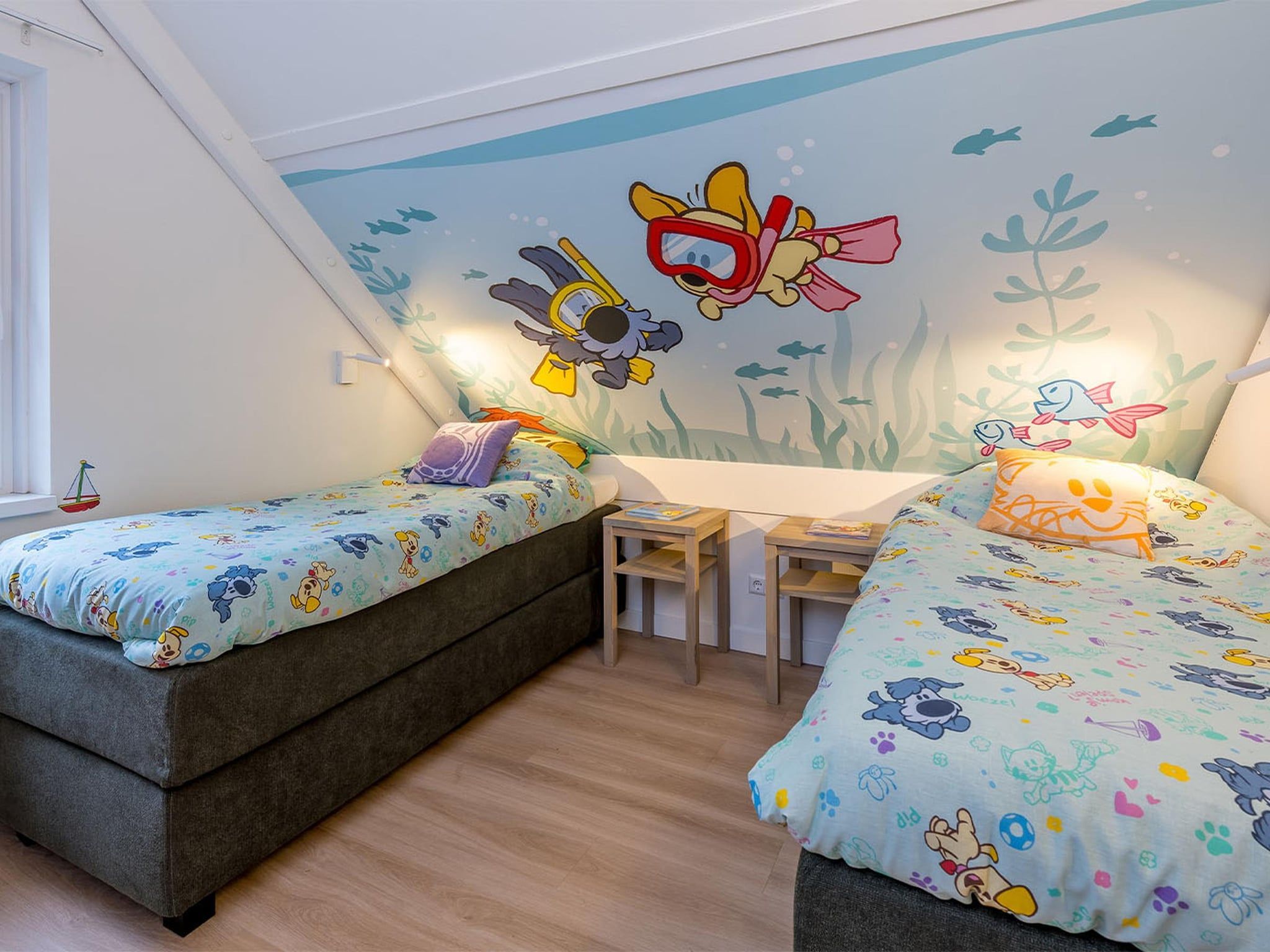 Een slaapkamer van Woezel & Pip Villa - Mindervaliden 8p in Hoogerheide
