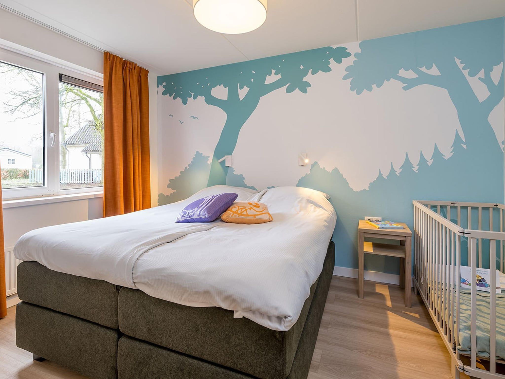 Een slaapkamer van Woezel & Pip Villa 8p in Hoogerheide