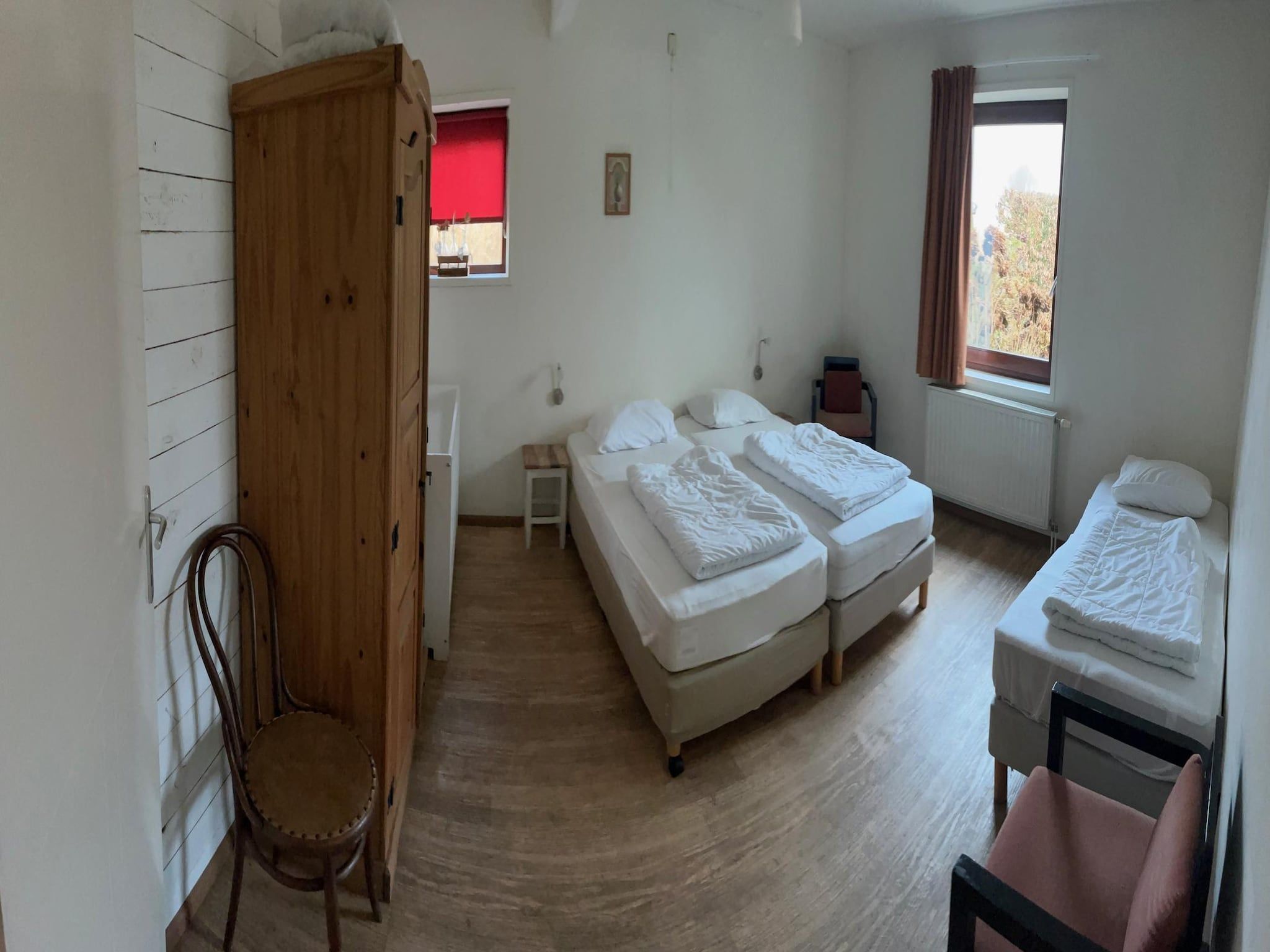 Een slaapkamer van Appartement De Hooizolder in Eede