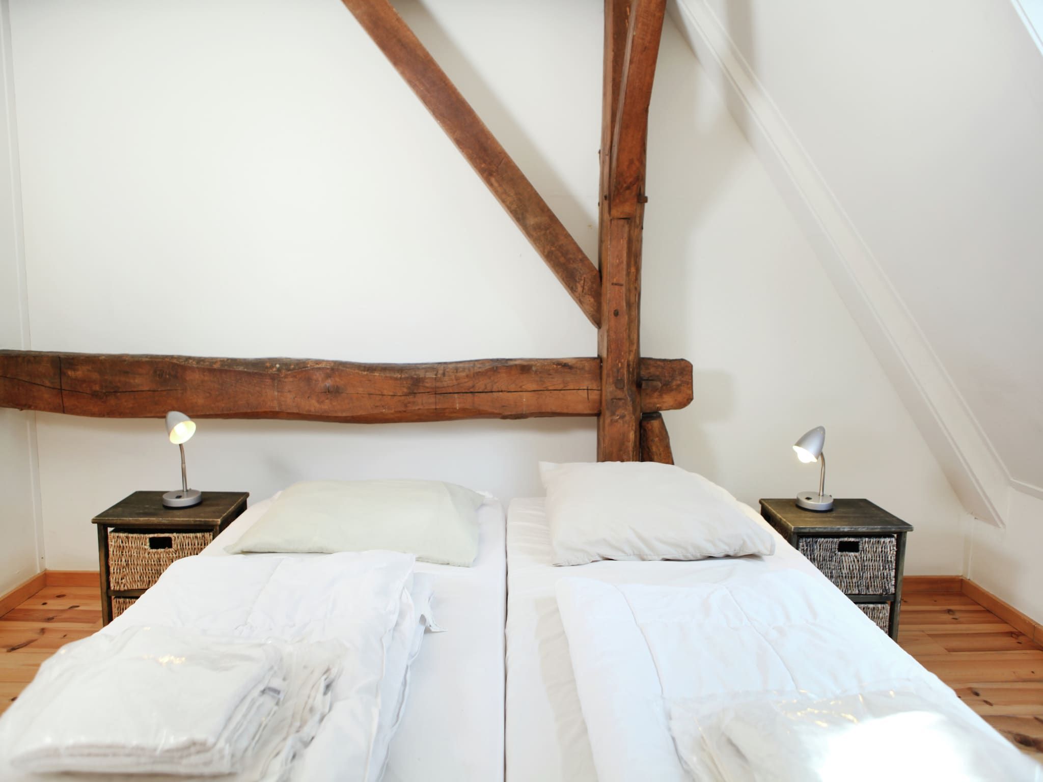 Een slaapkamer van Appartement De Dorsvloer in Eede