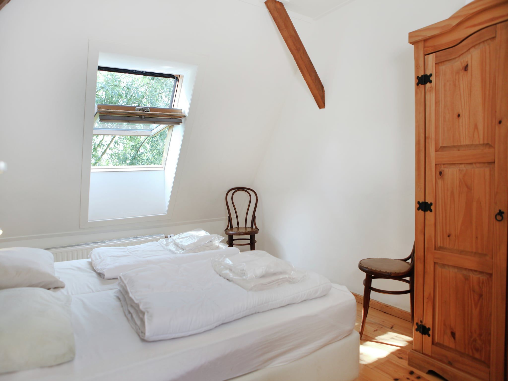 Een slaapkamer van Appartement De Dorsvloer in Eede