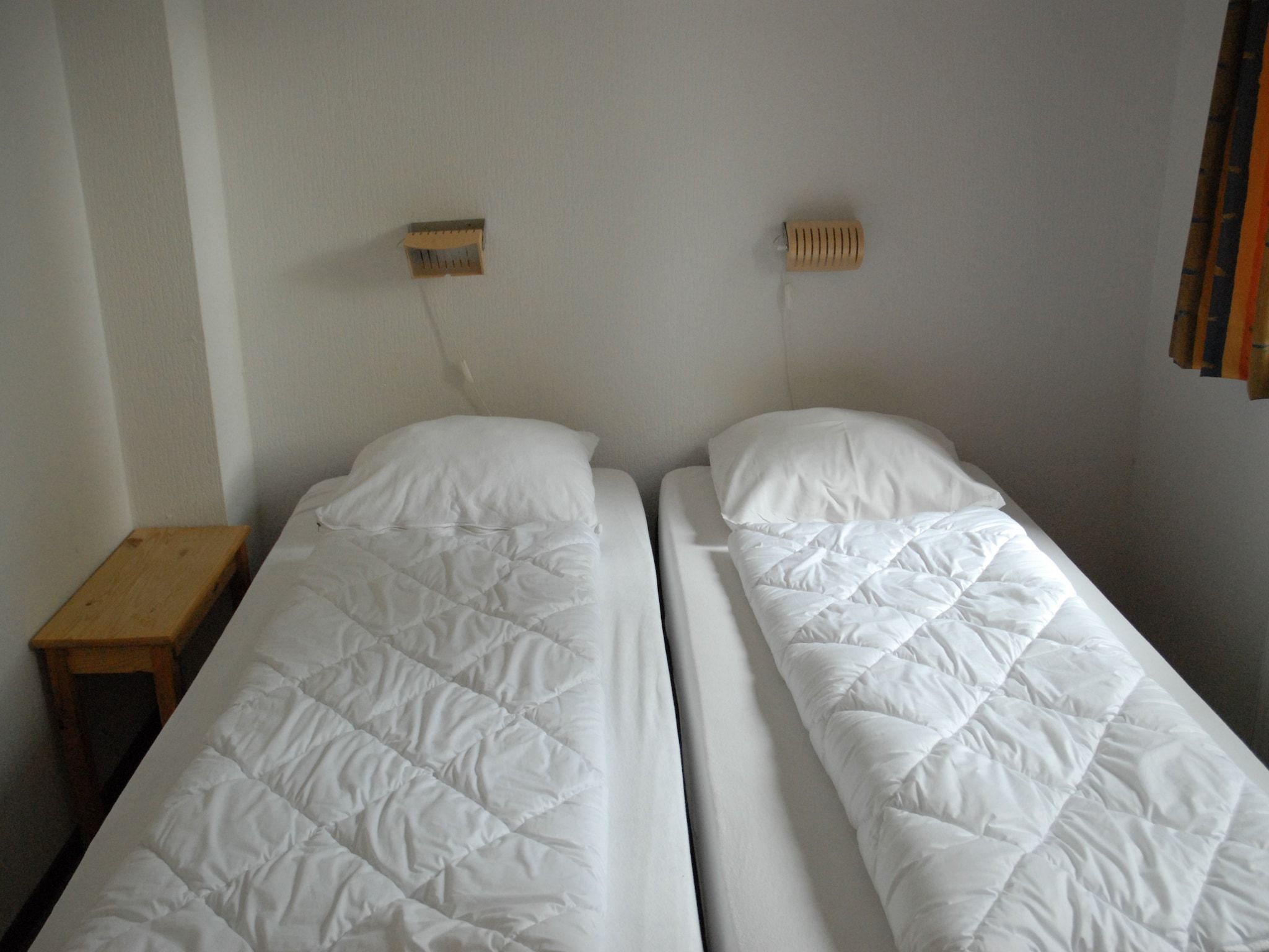 Een slaapkamer van Landgoed Eysinga State 2 in Sint Nicolaasga