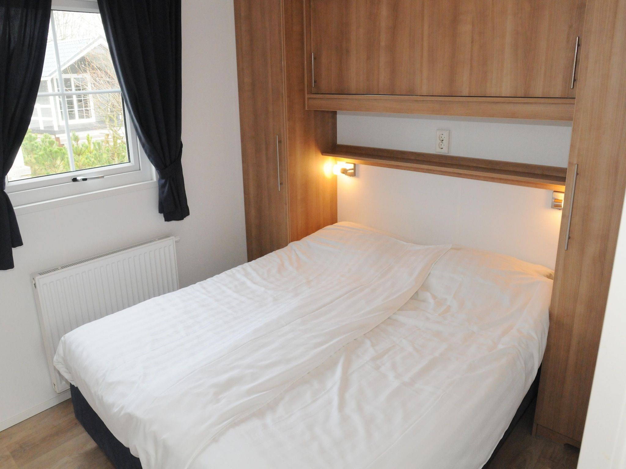 Een slaapkamer van Villetta (6p) in Den Burg