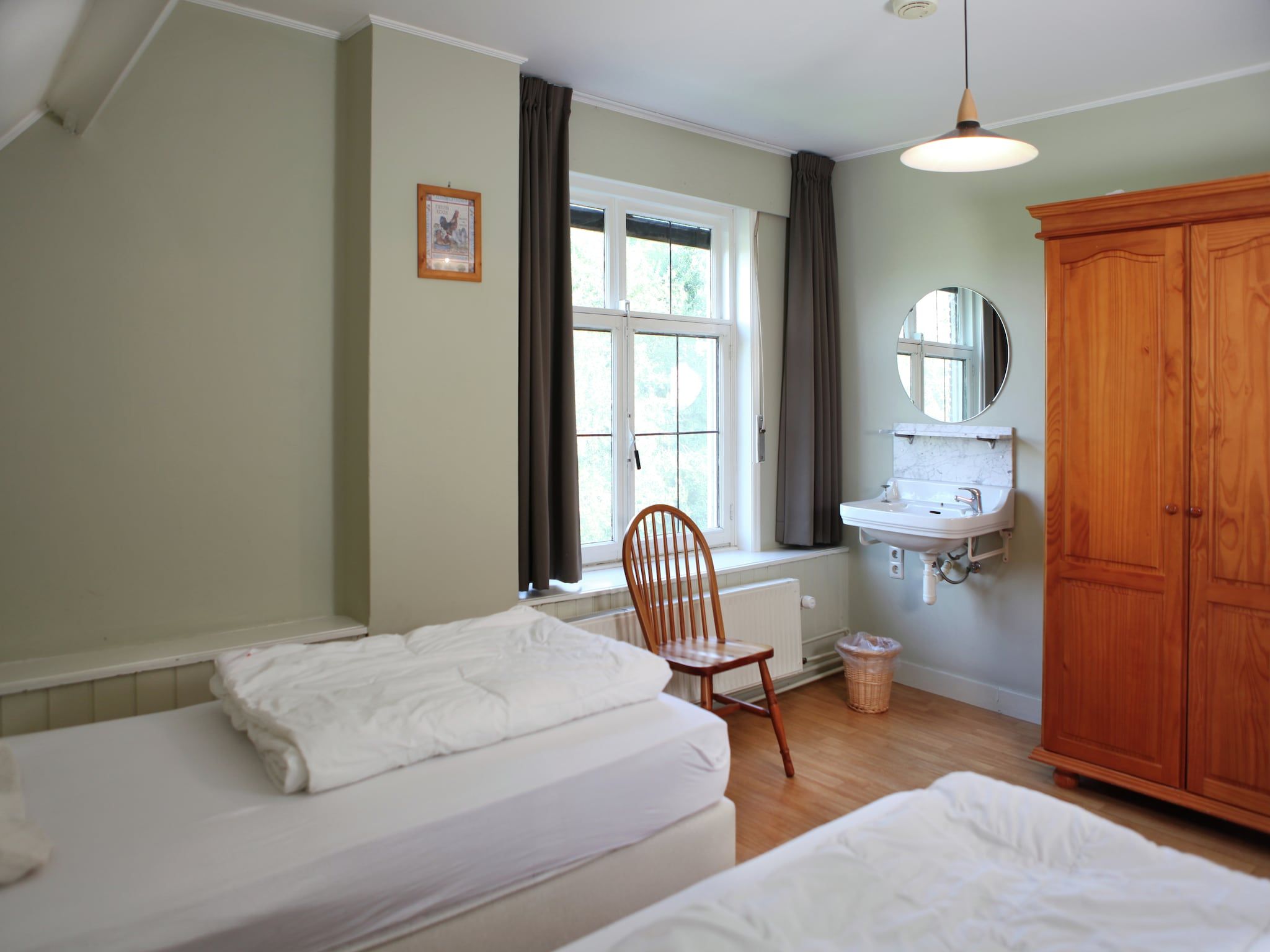 Een slaapkamer van De Biezenpolder 't Groothuus in Eede