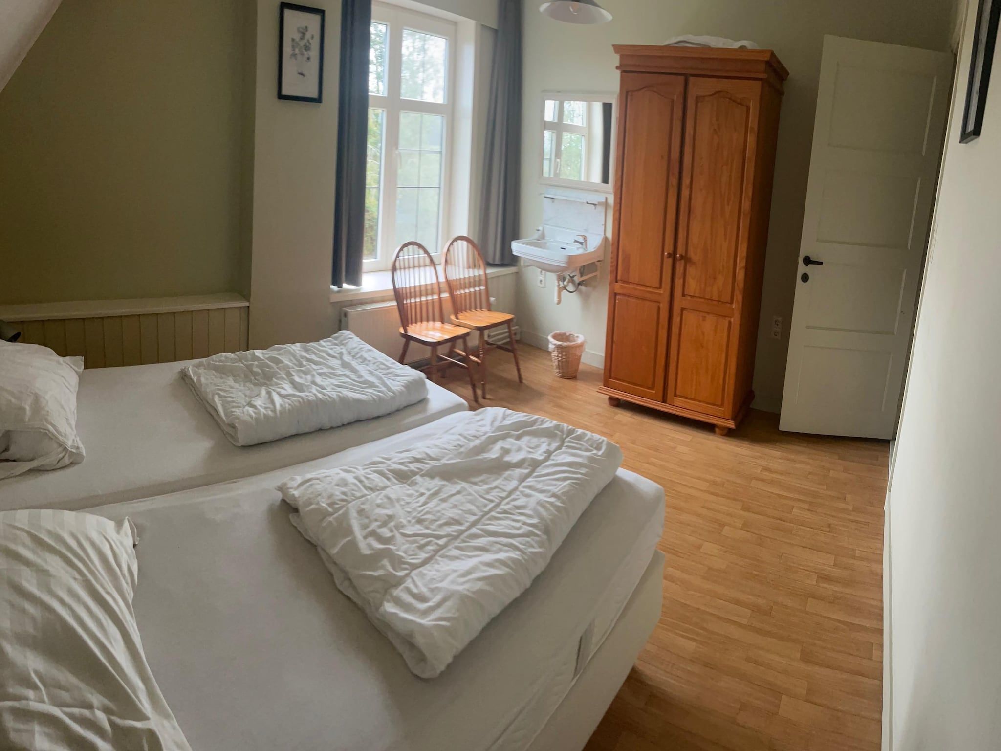 Een slaapkamer van De Biezenpolder 't Groothuus in Eede