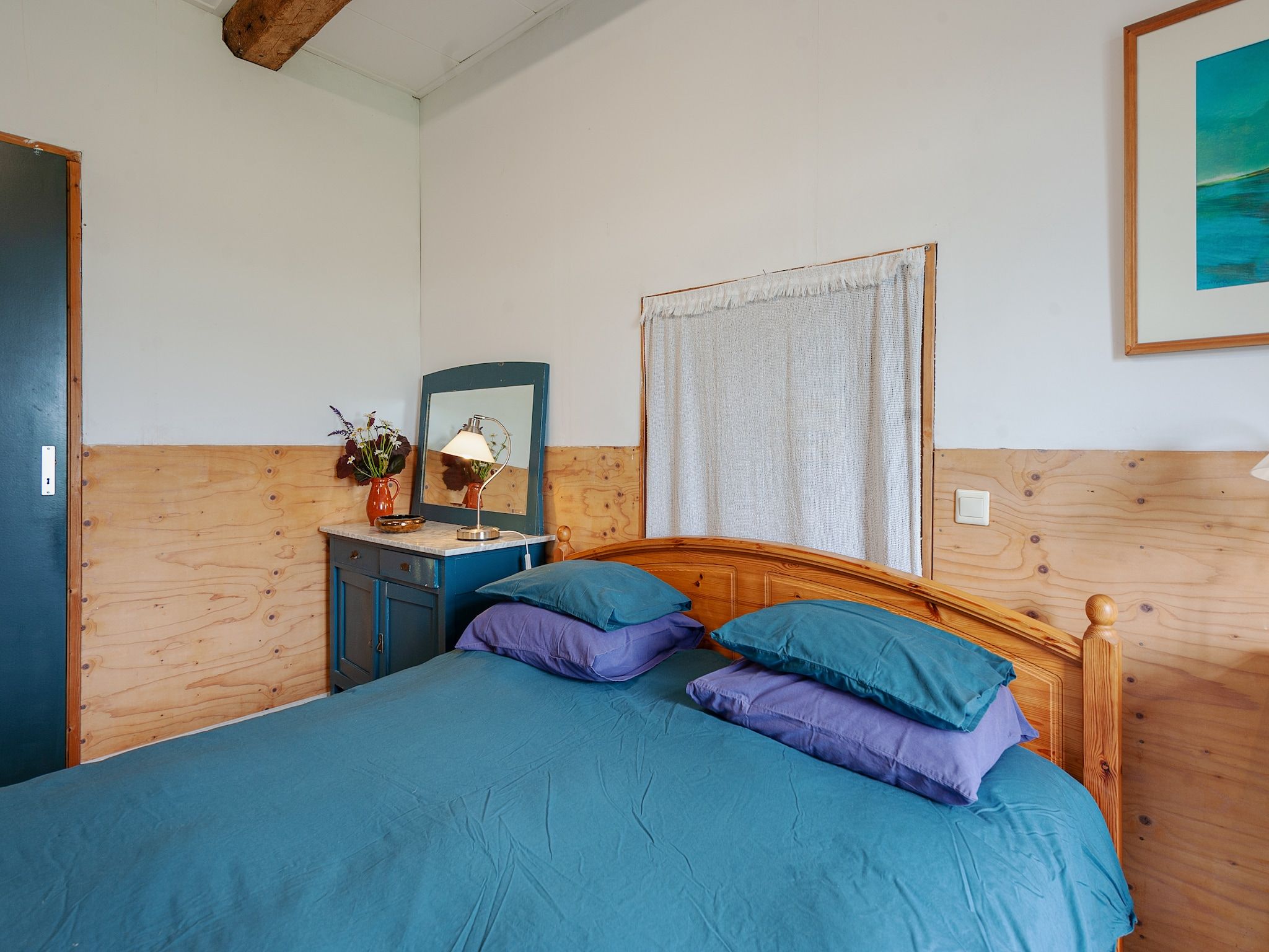 Een slaapkamer van Lauwerspleats in Burum