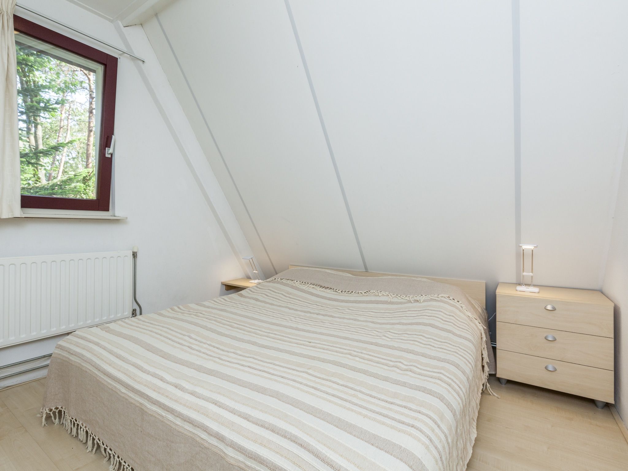 Een slaapkamer van Kleine Vos in Nunspeet