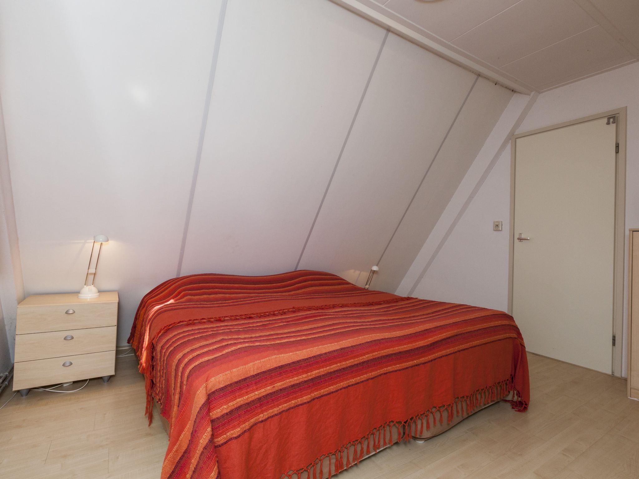 Een slaapkamer van Kleine Vos in Nunspeet