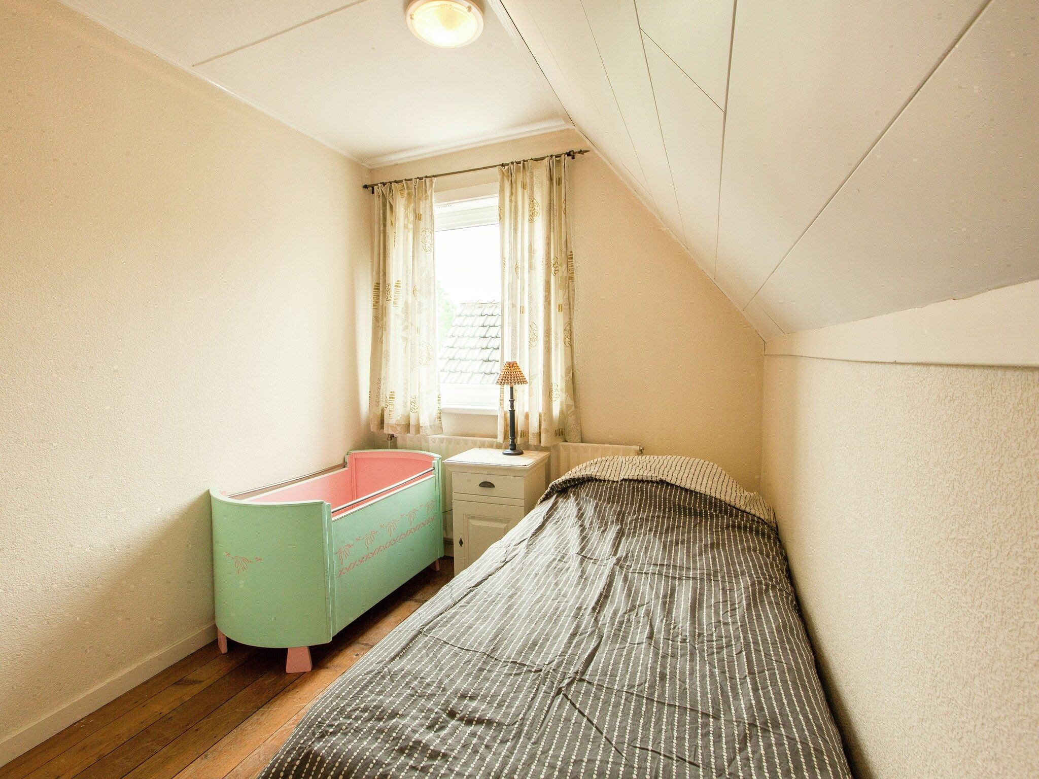 Een slaapkamer van De Paardenmarkt in Aardenburg