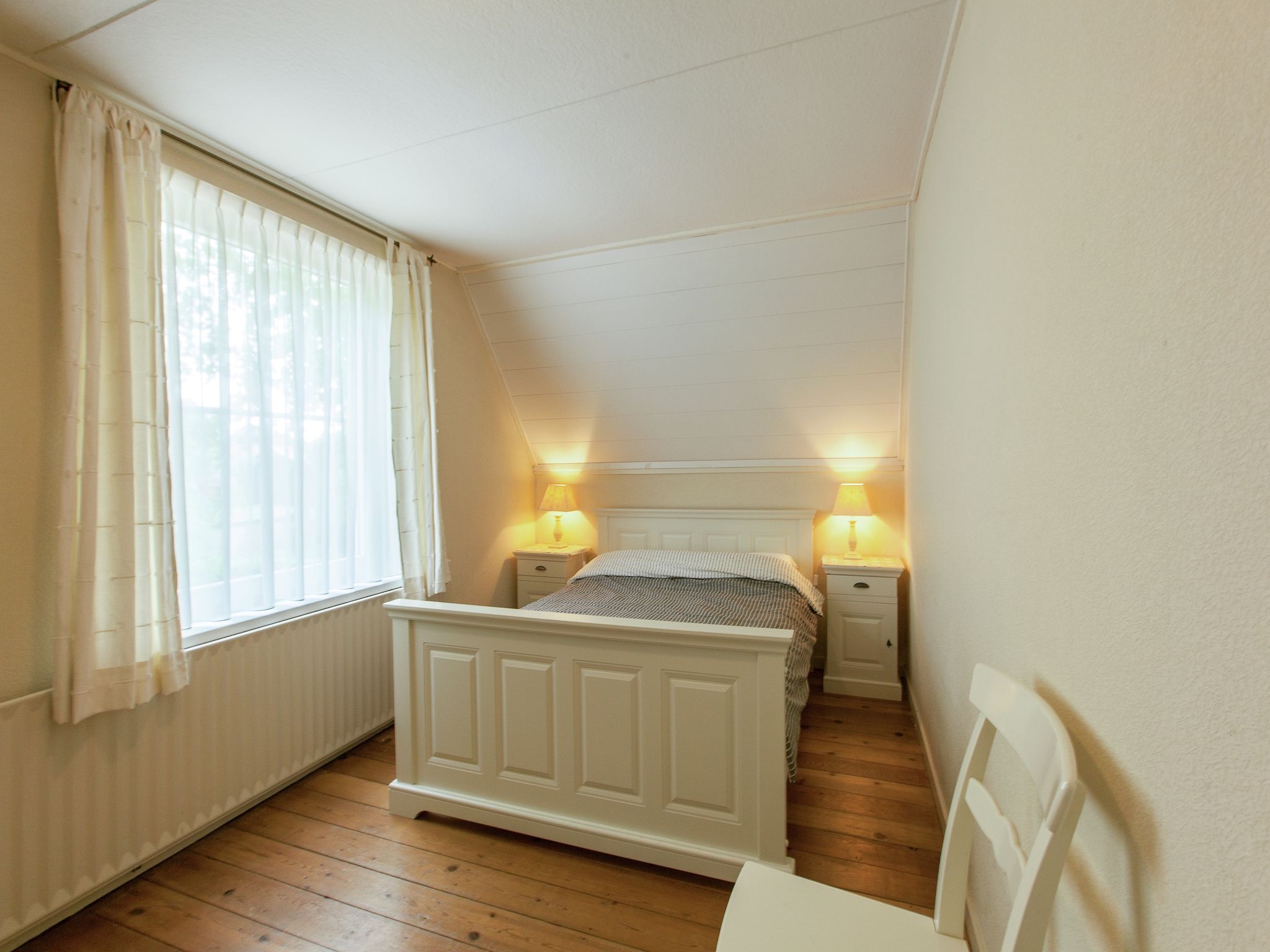 Een slaapkamer van De Paardenmarkt in Aardenburg