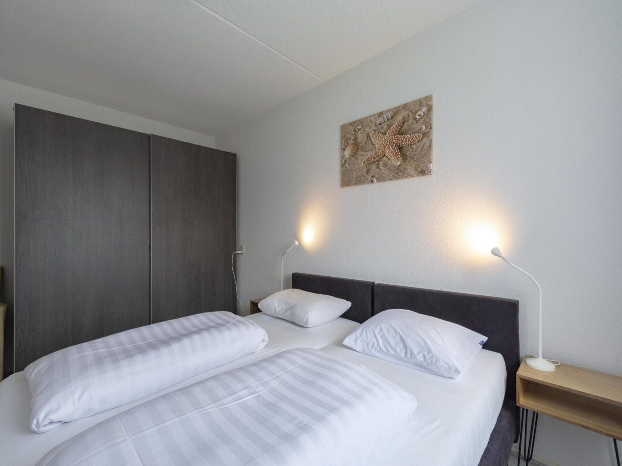 Een slaapkamer van Residence Juliana 58 | Julianadorp aan Zee | Balcony (copy) in Julianadorp