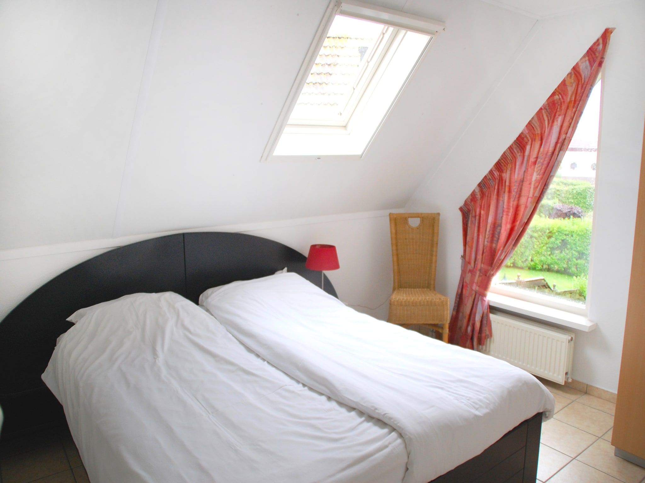 Een slaapkamer van Waterwoning 6 in Medemblik