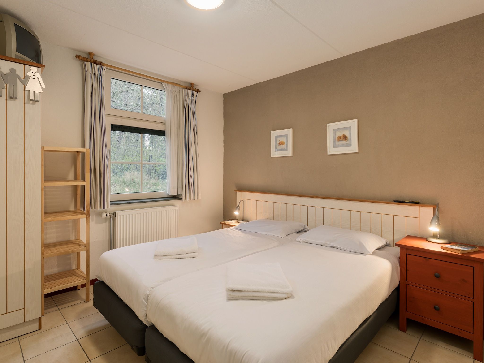 Een slaapkamer van Kustpark Texel 2 in De Koog