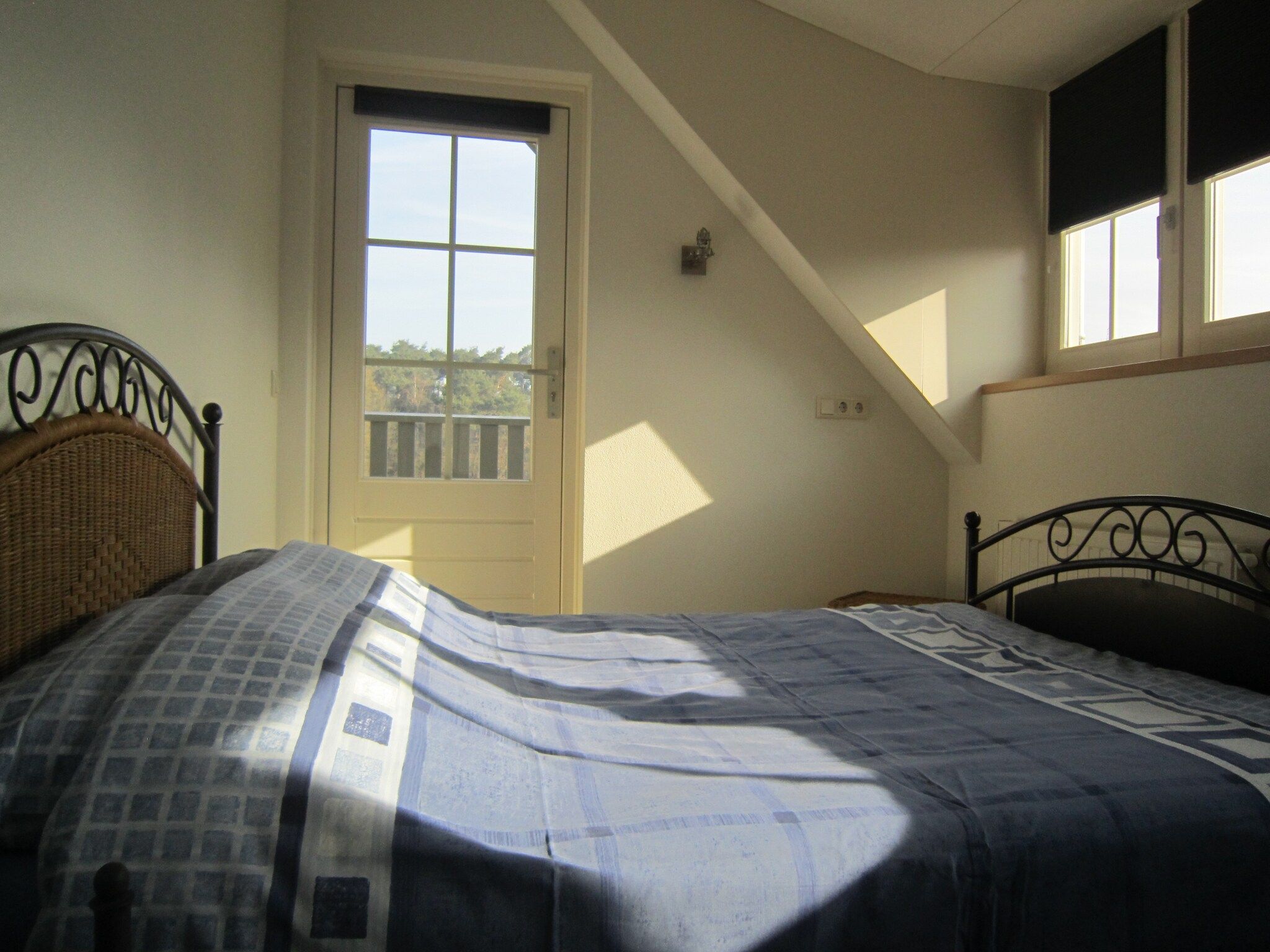 Een slaapkamer van Le Petit Miracle in Well