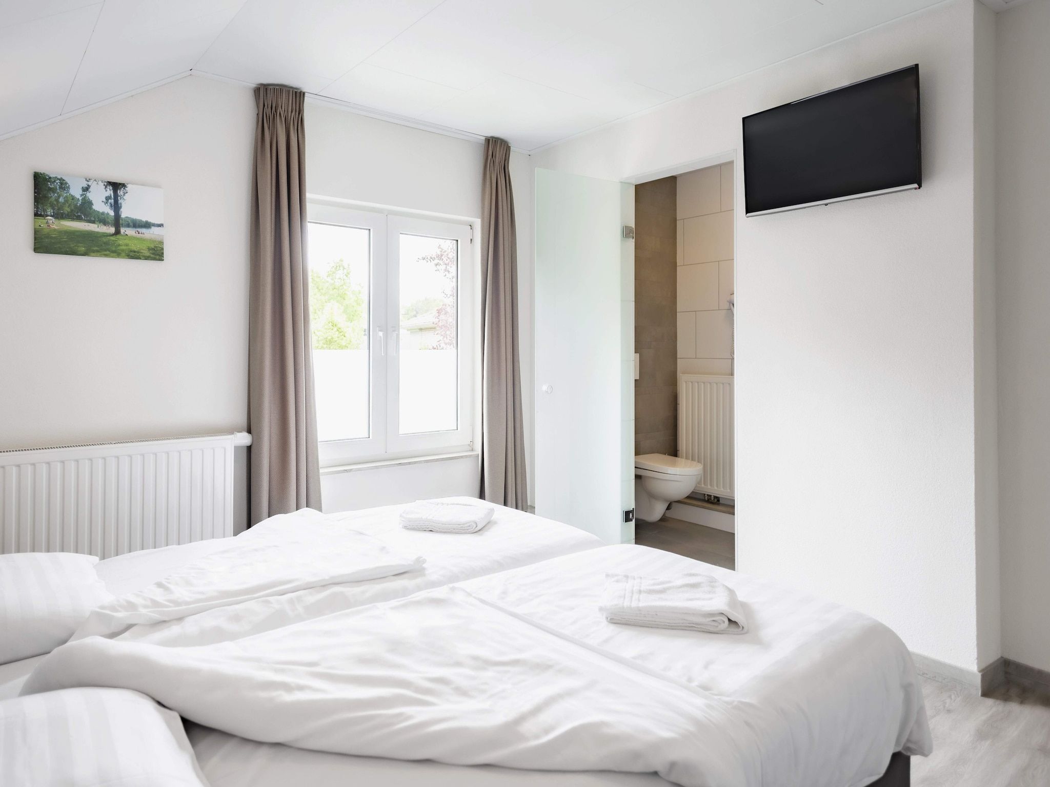 Een slaapkamer van De Riethorst 2 in Plasmolen