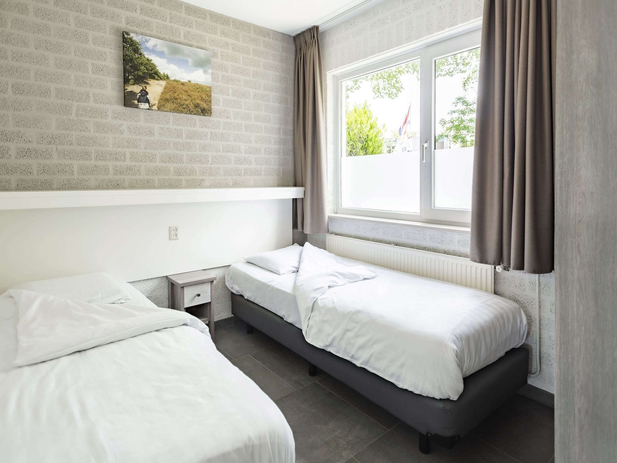 Een slaapkamer van De Riethorst 2 in Plasmolen