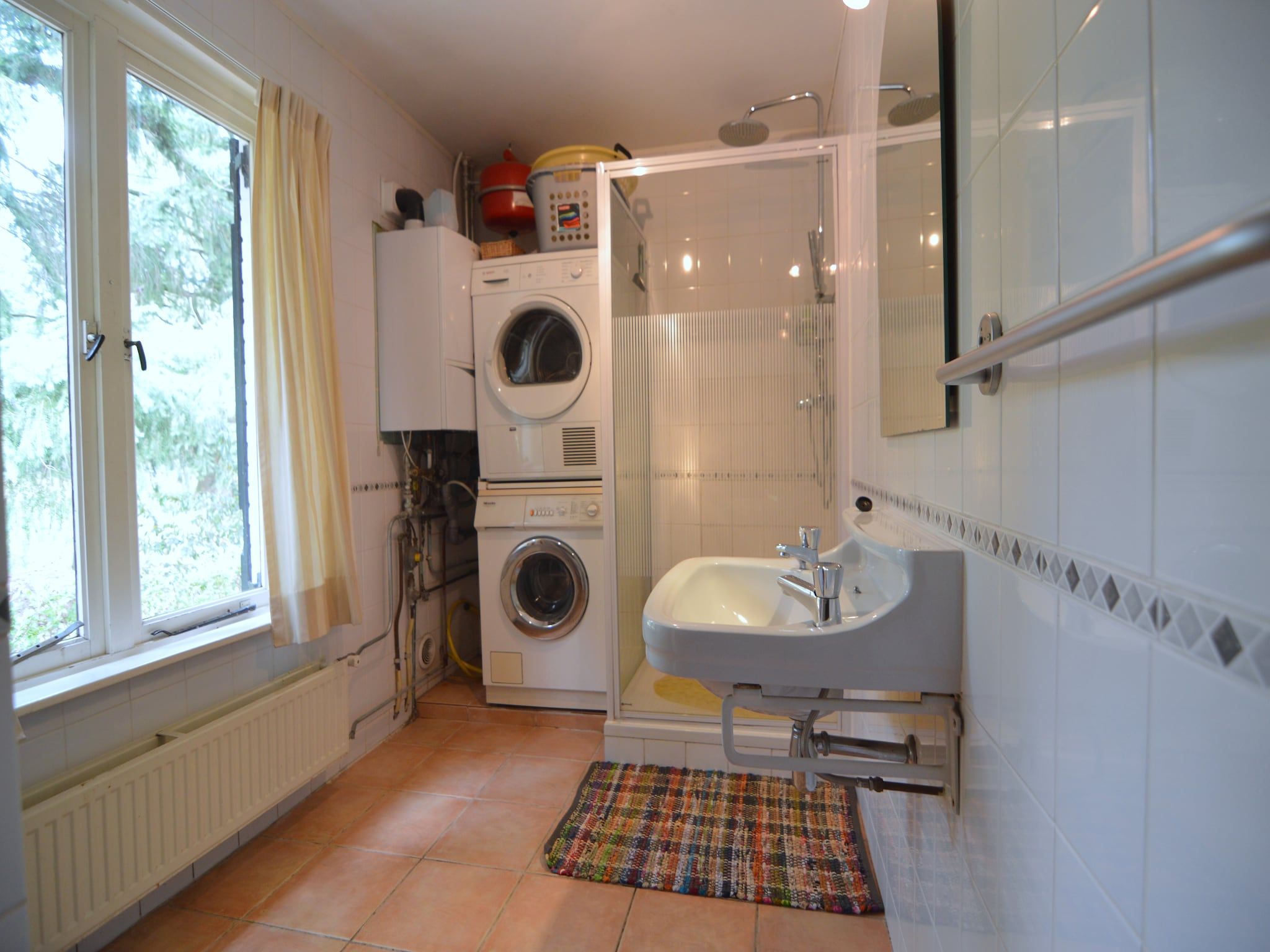 De badkamer van Huis in het bos in Oploo