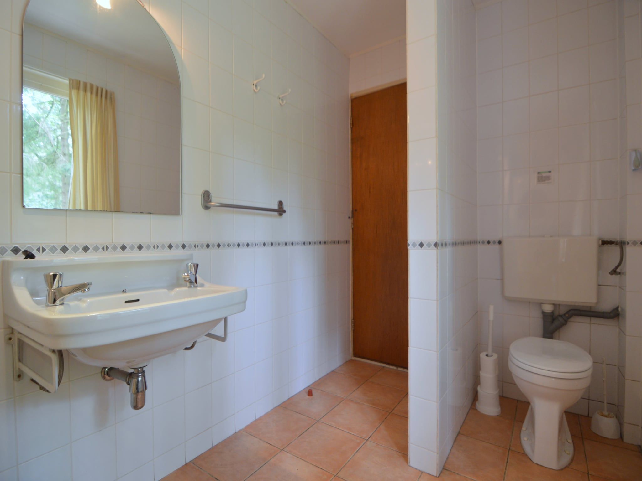 De badkamer van Huis in het bos in Oploo