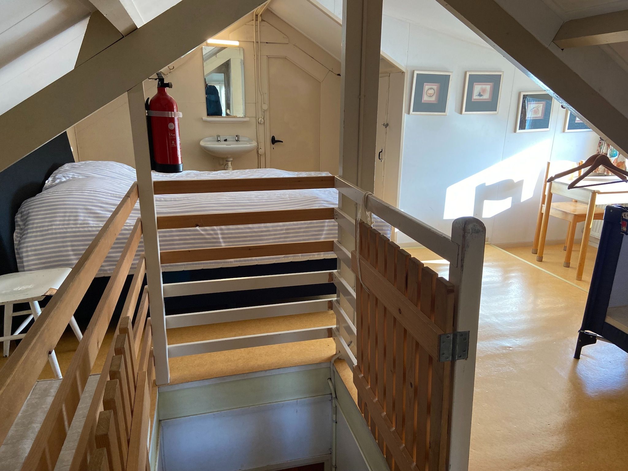 Een slaapkamer van Huis in het bos in Oploo