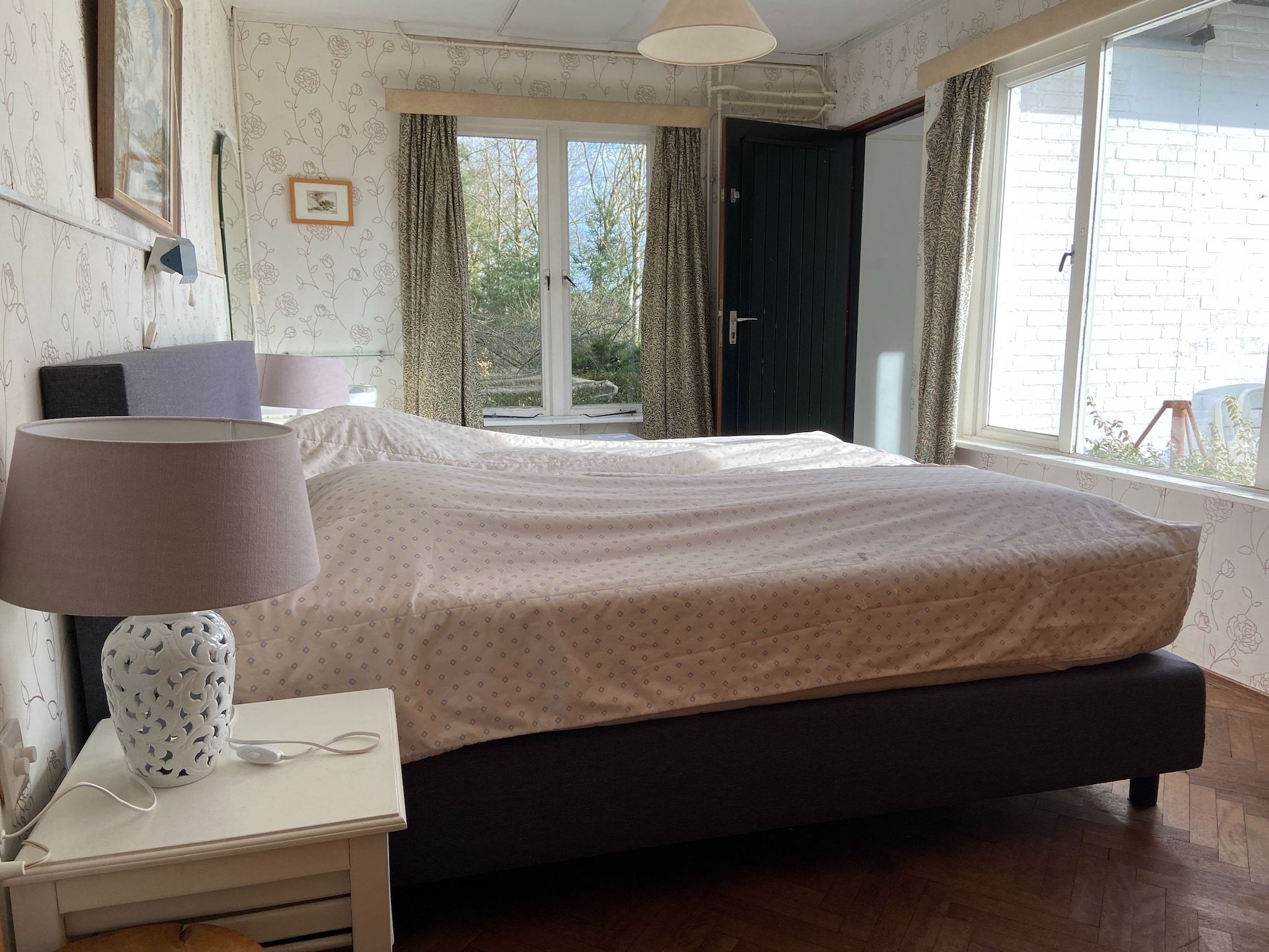 Een slaapkamer van Huis in het bos in Oploo